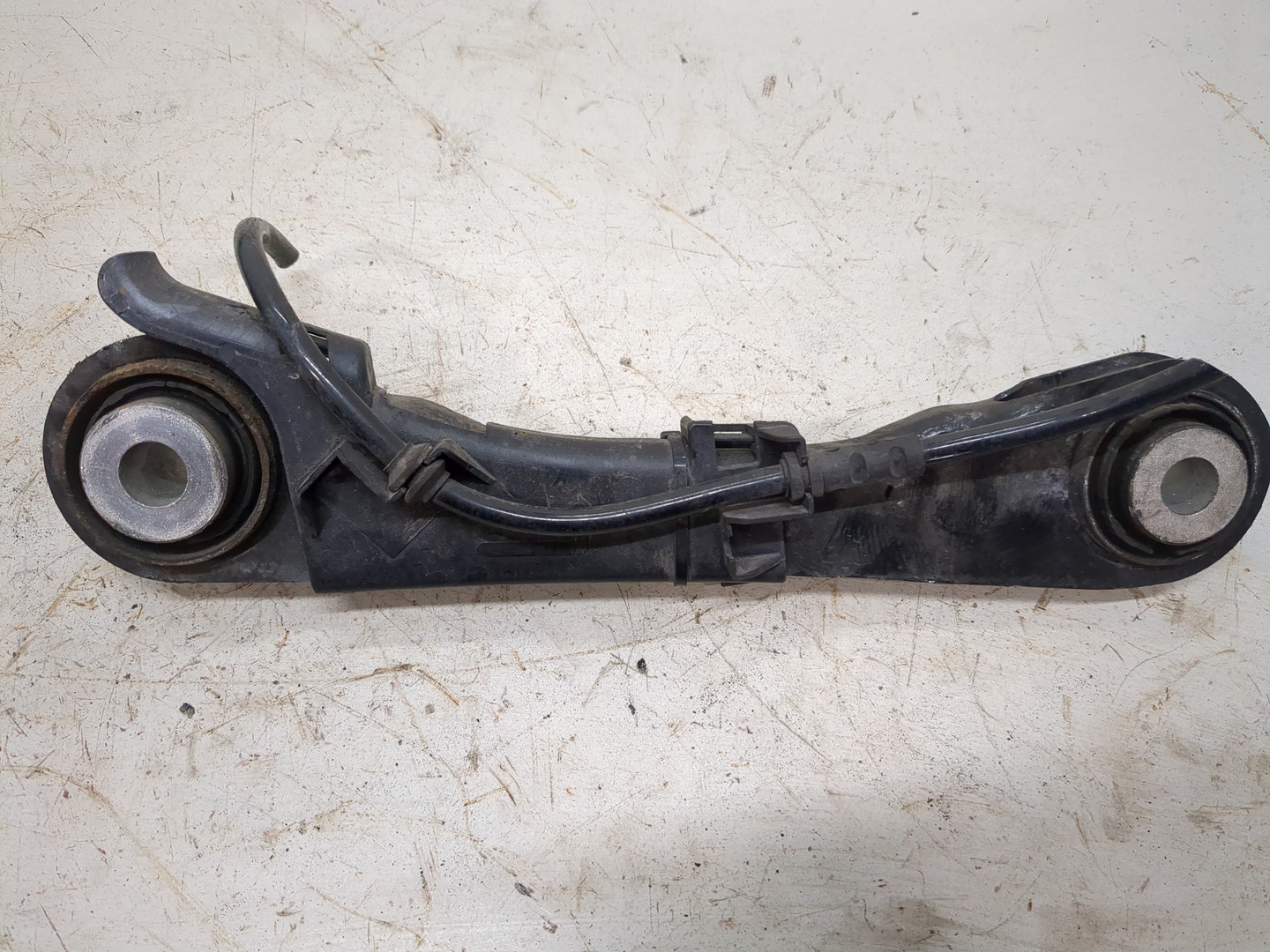 Рычаг задний левый
