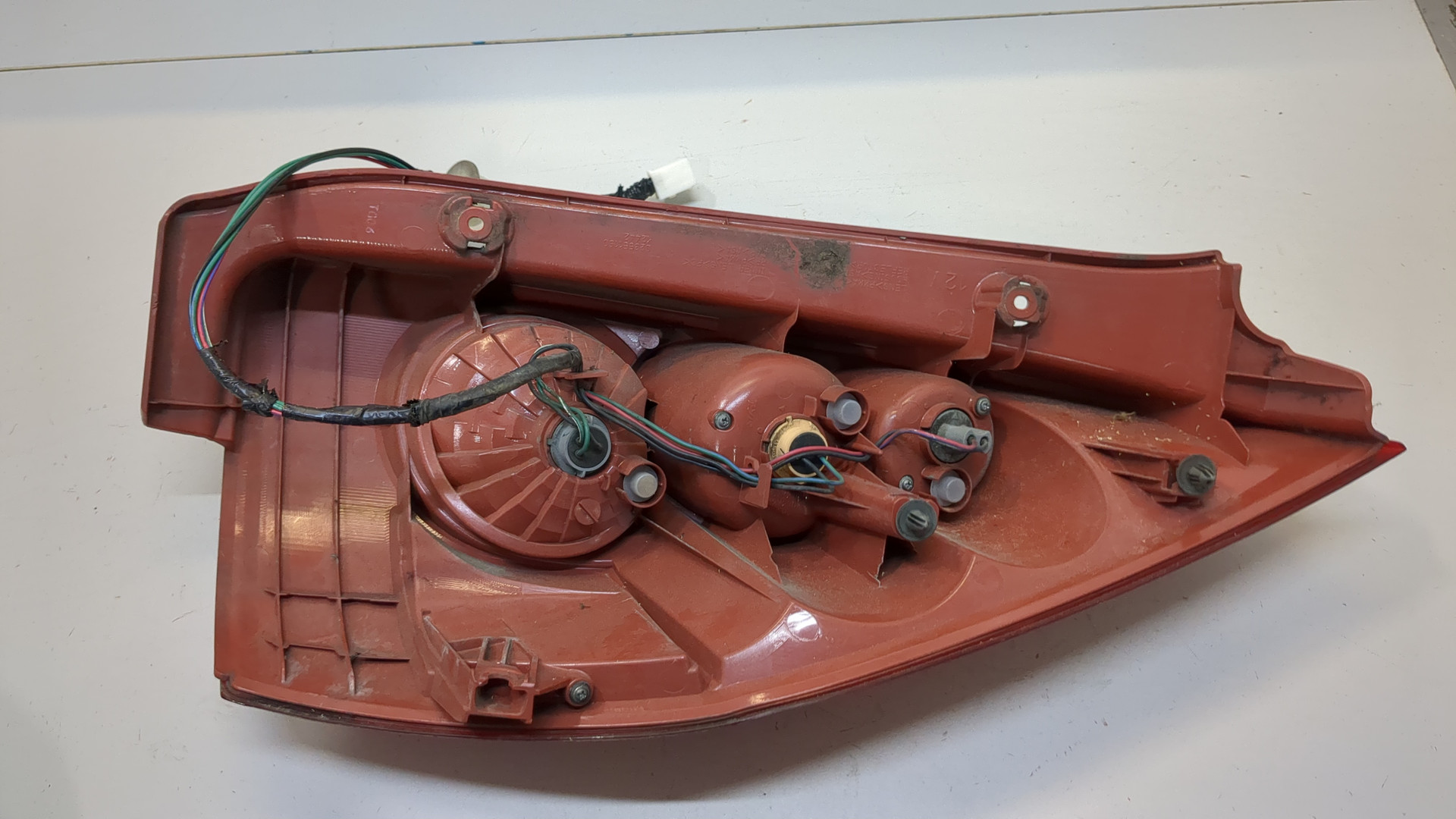 Фонарь задний левый