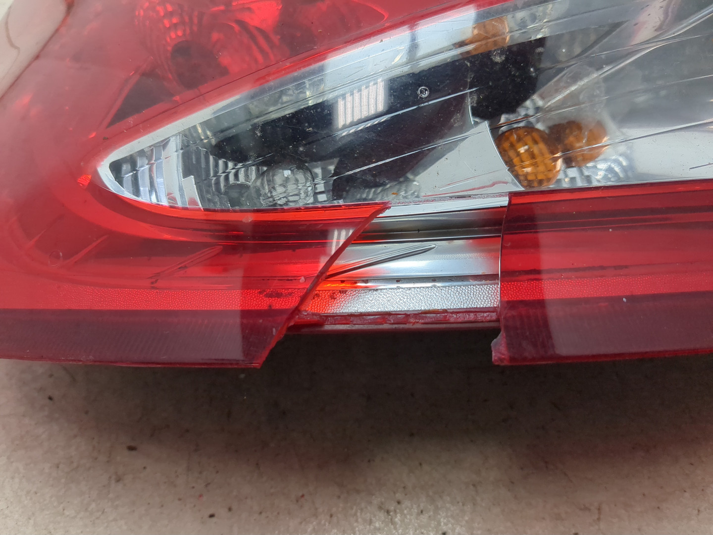 Фонарь задний левый