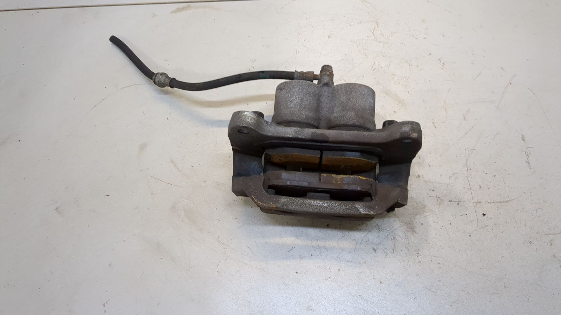 Суппорт передний левый