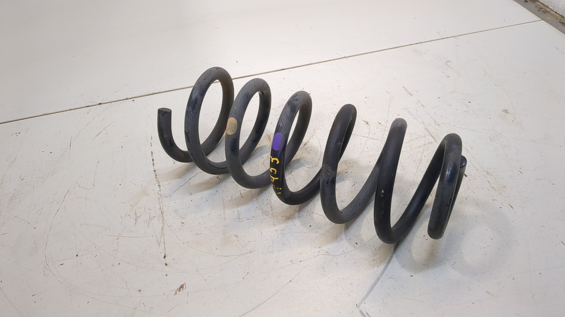 Пружина задняя