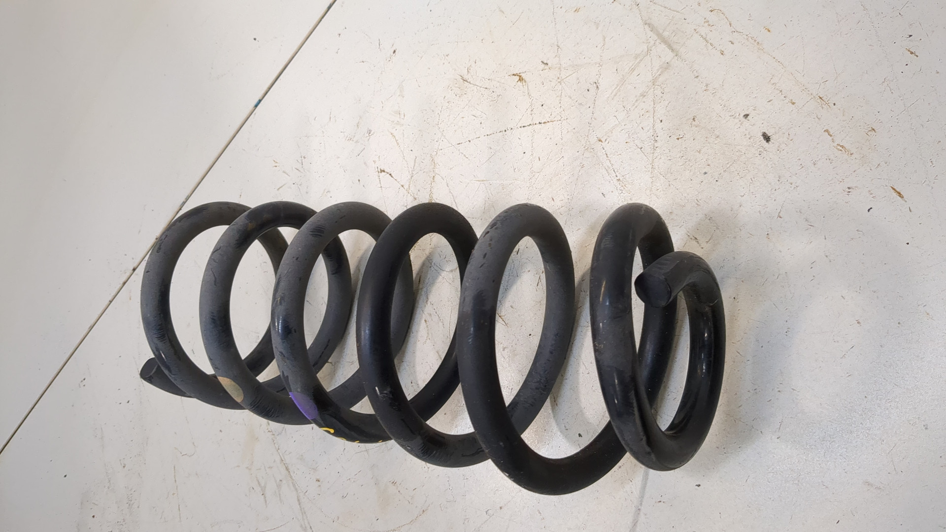 Пружина задняя