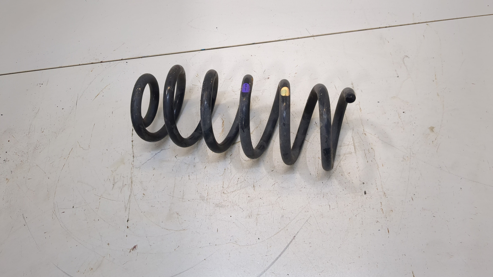 Пружина задняя