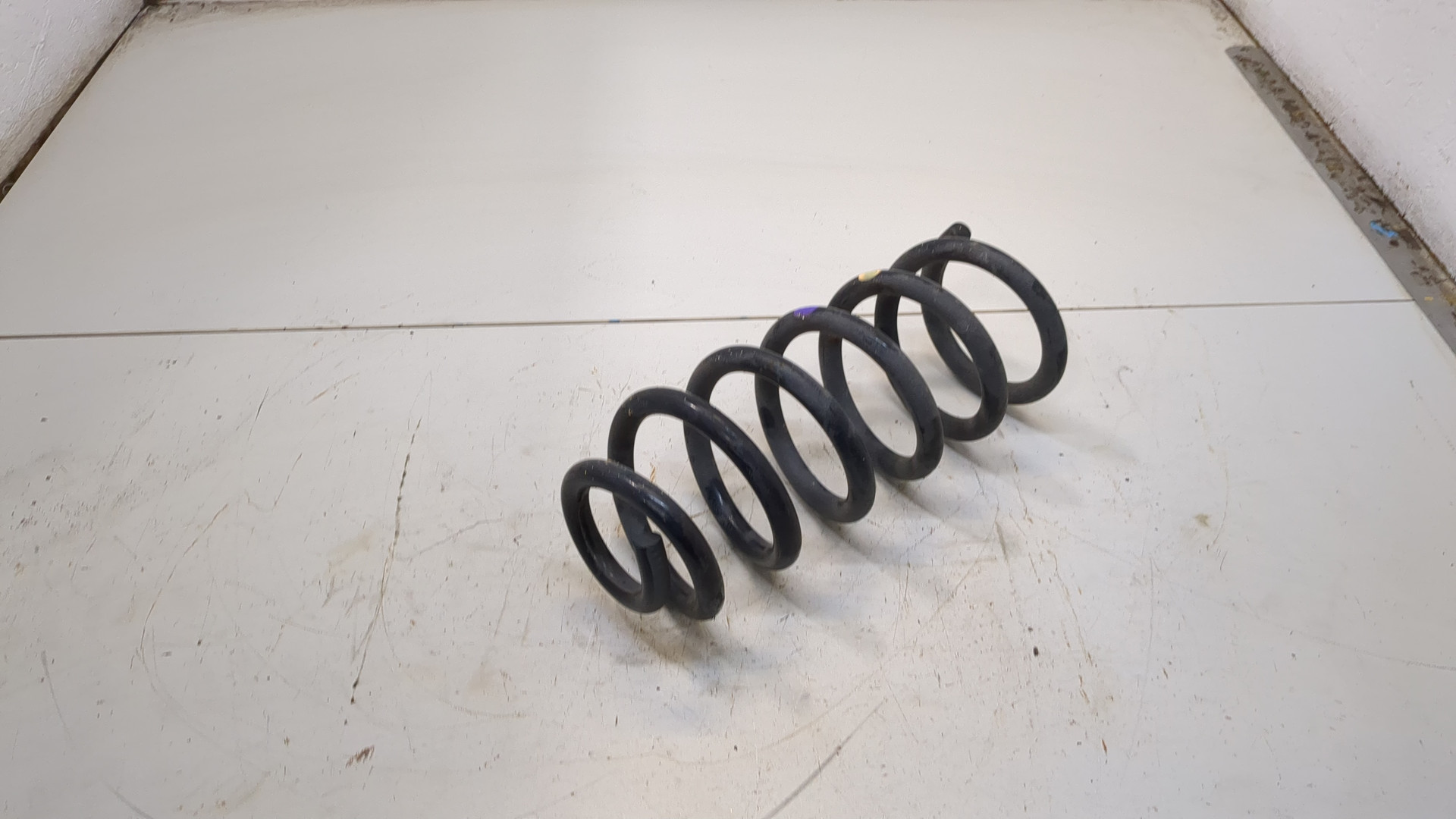 Пружина задняя