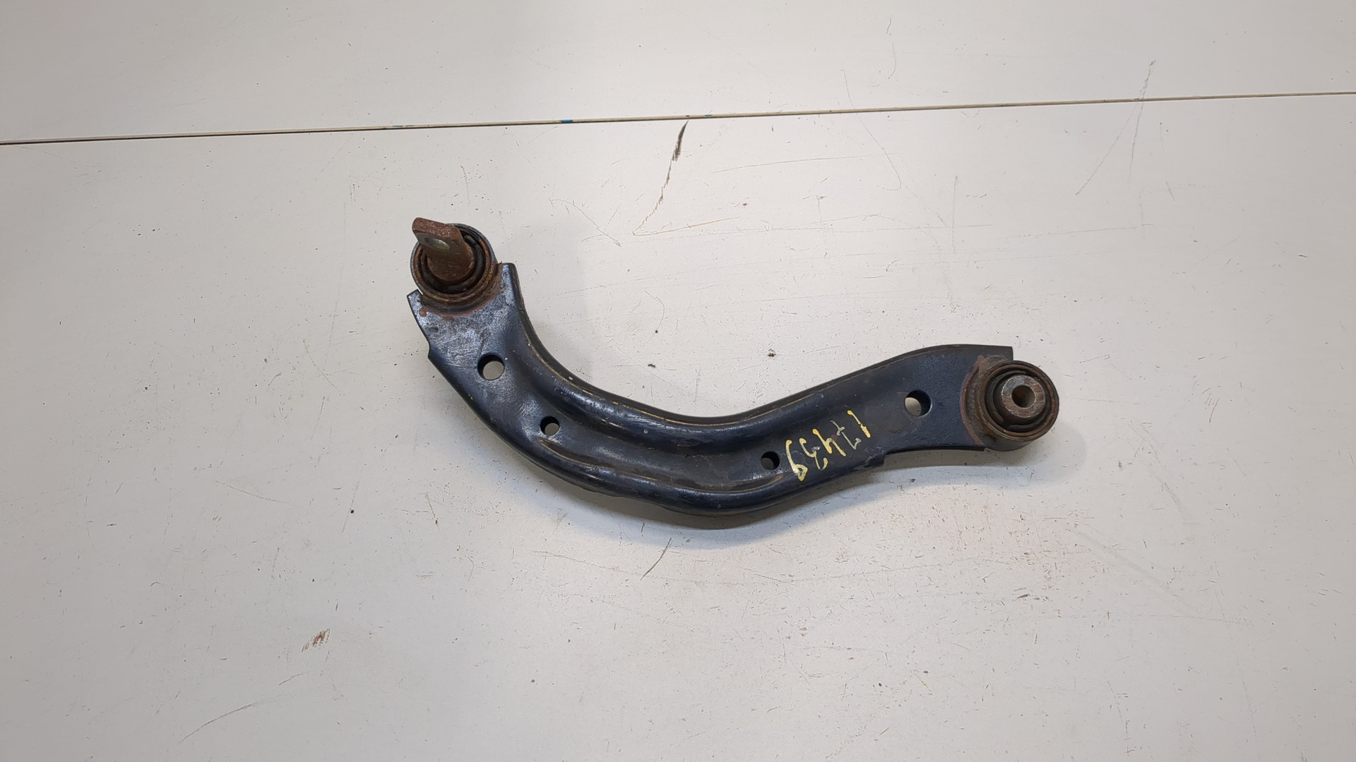 Рычаг задний