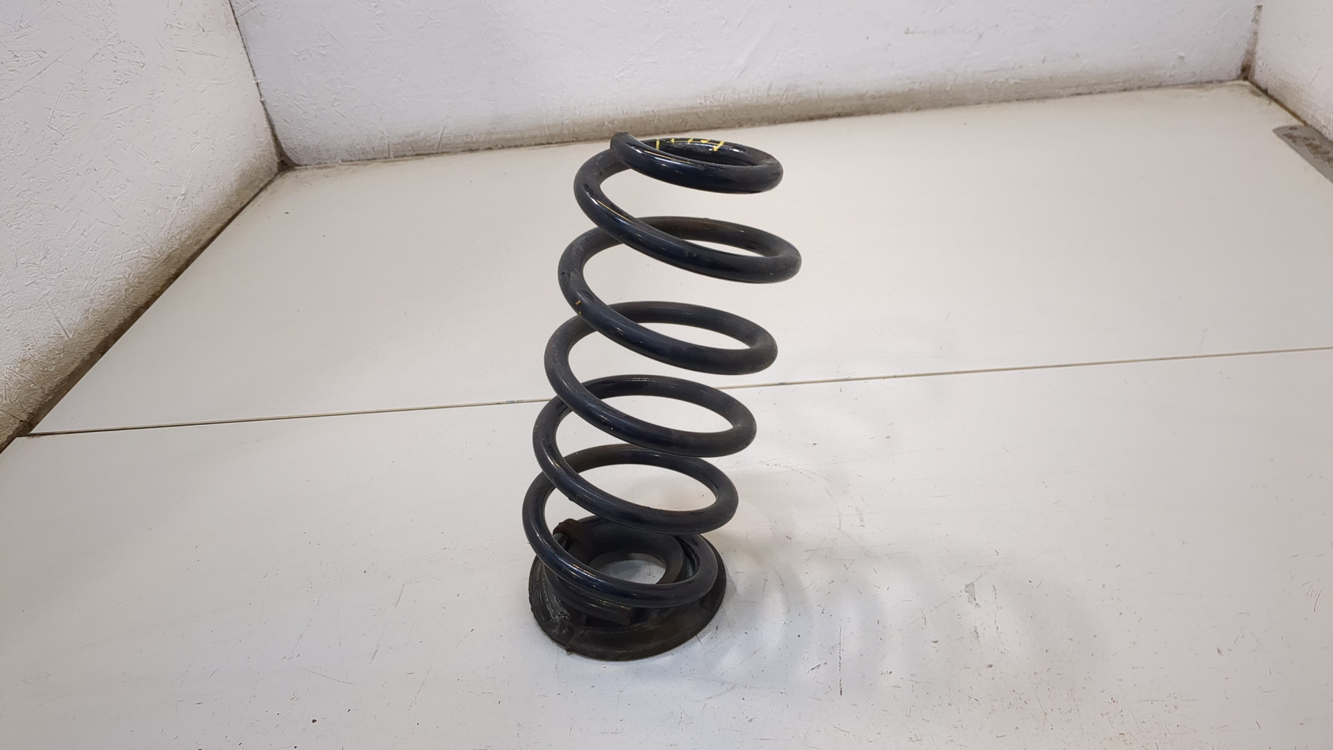 Пружина задняя