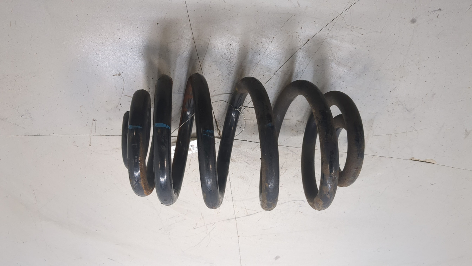 Пружина задняя