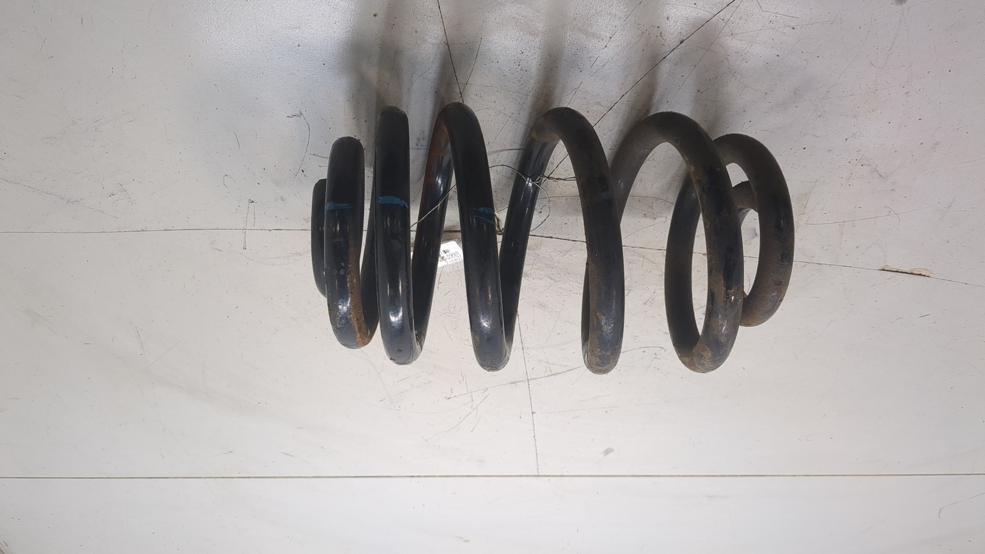 Пружина задняя