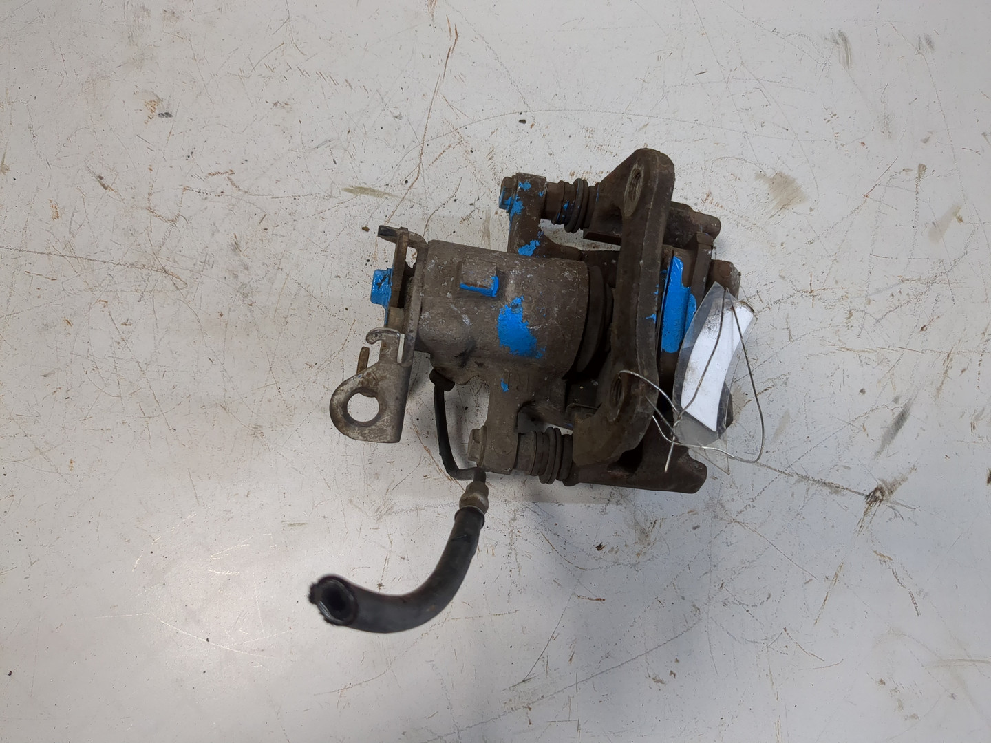 Суппорт задний левый