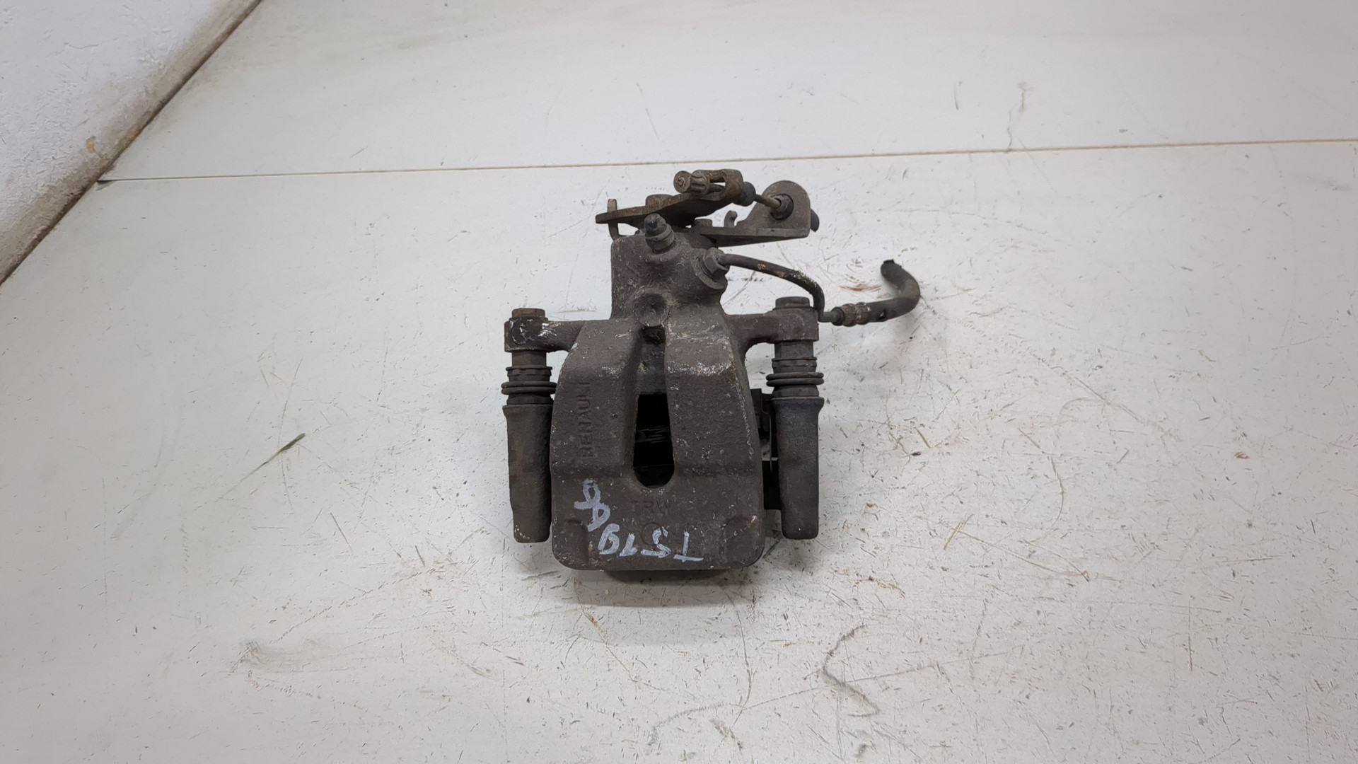 Суппорт задний левый