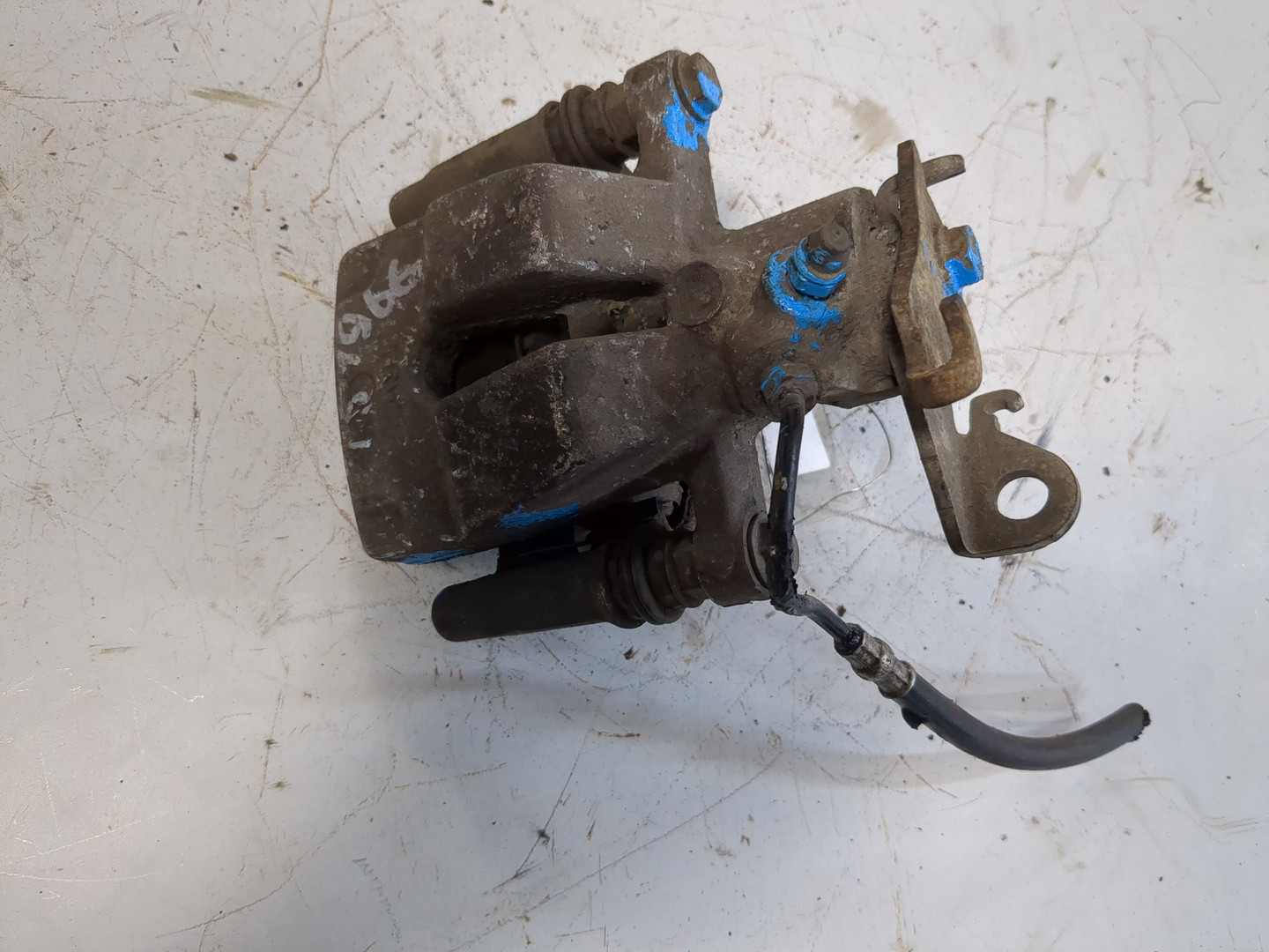 Суппорт задний левый