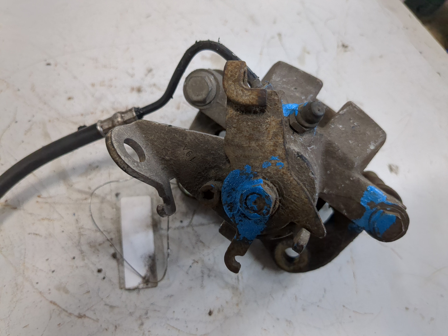 Суппорт задний левый