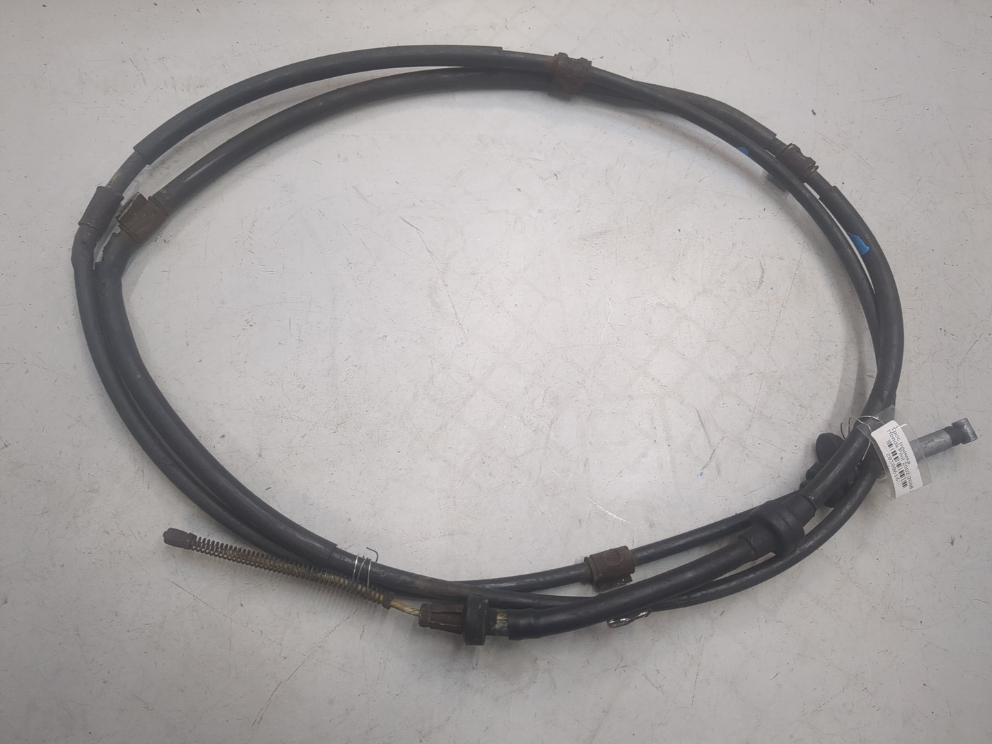 Трос стояночного тормоза