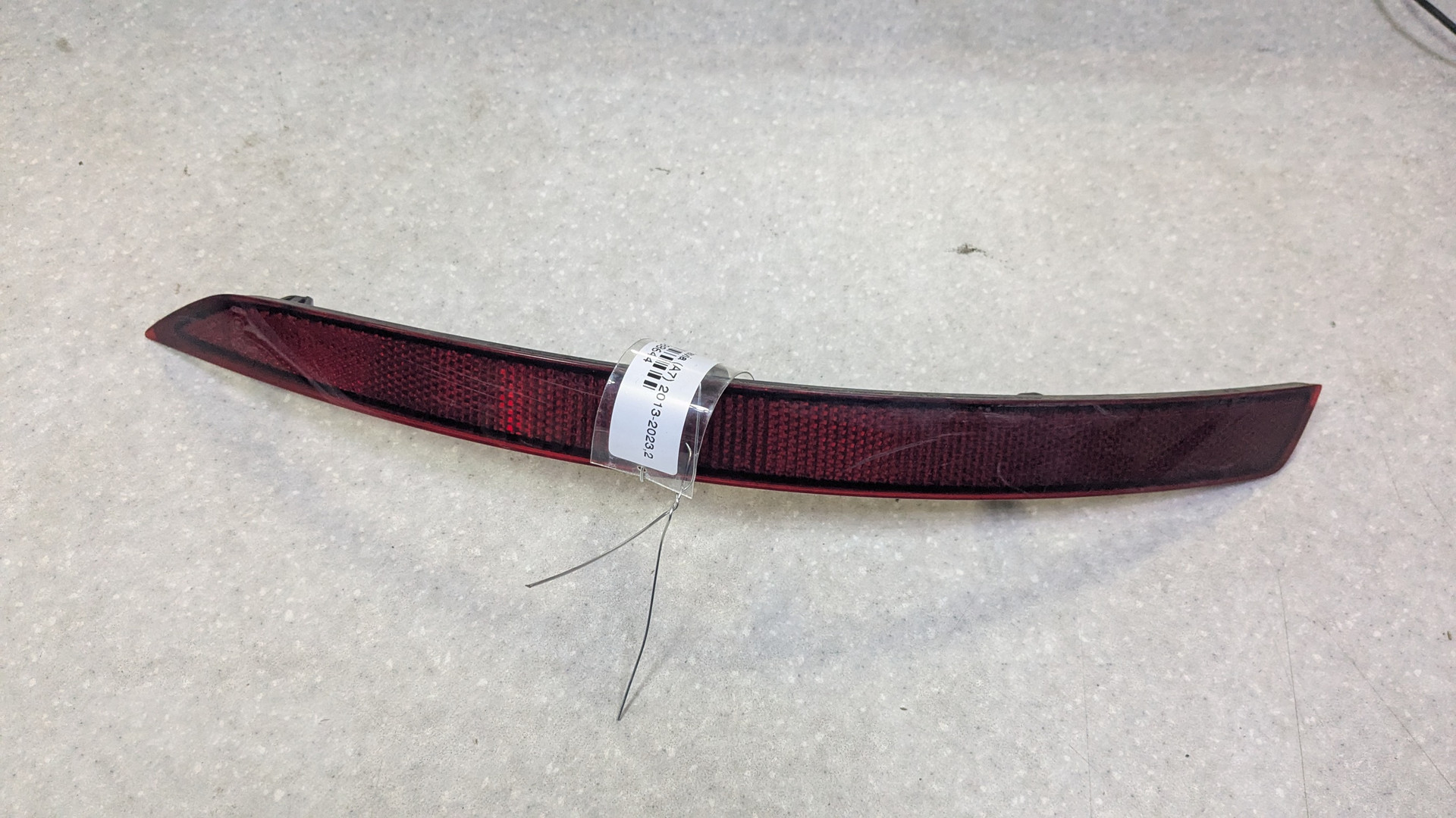 Отражатель в бампер задний левый