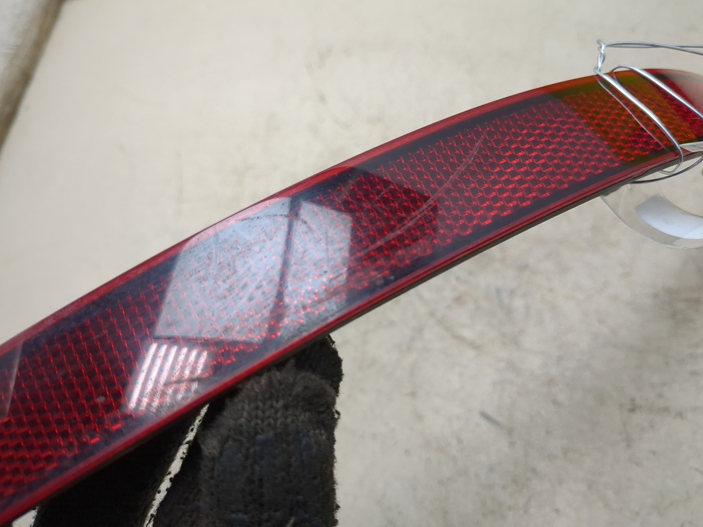 Отражатель в бампер задний левый