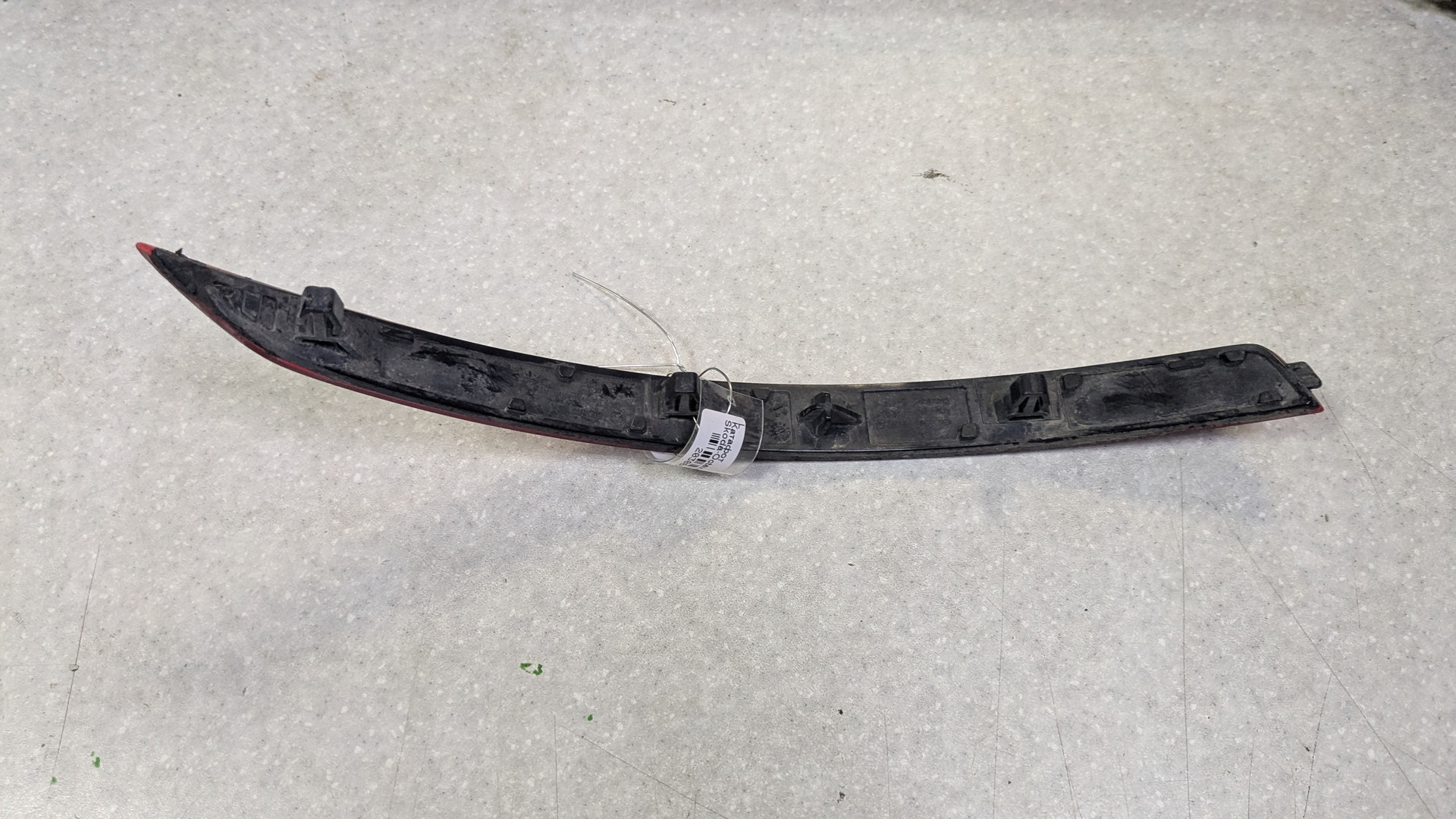 Отражатель в бампер задний левый