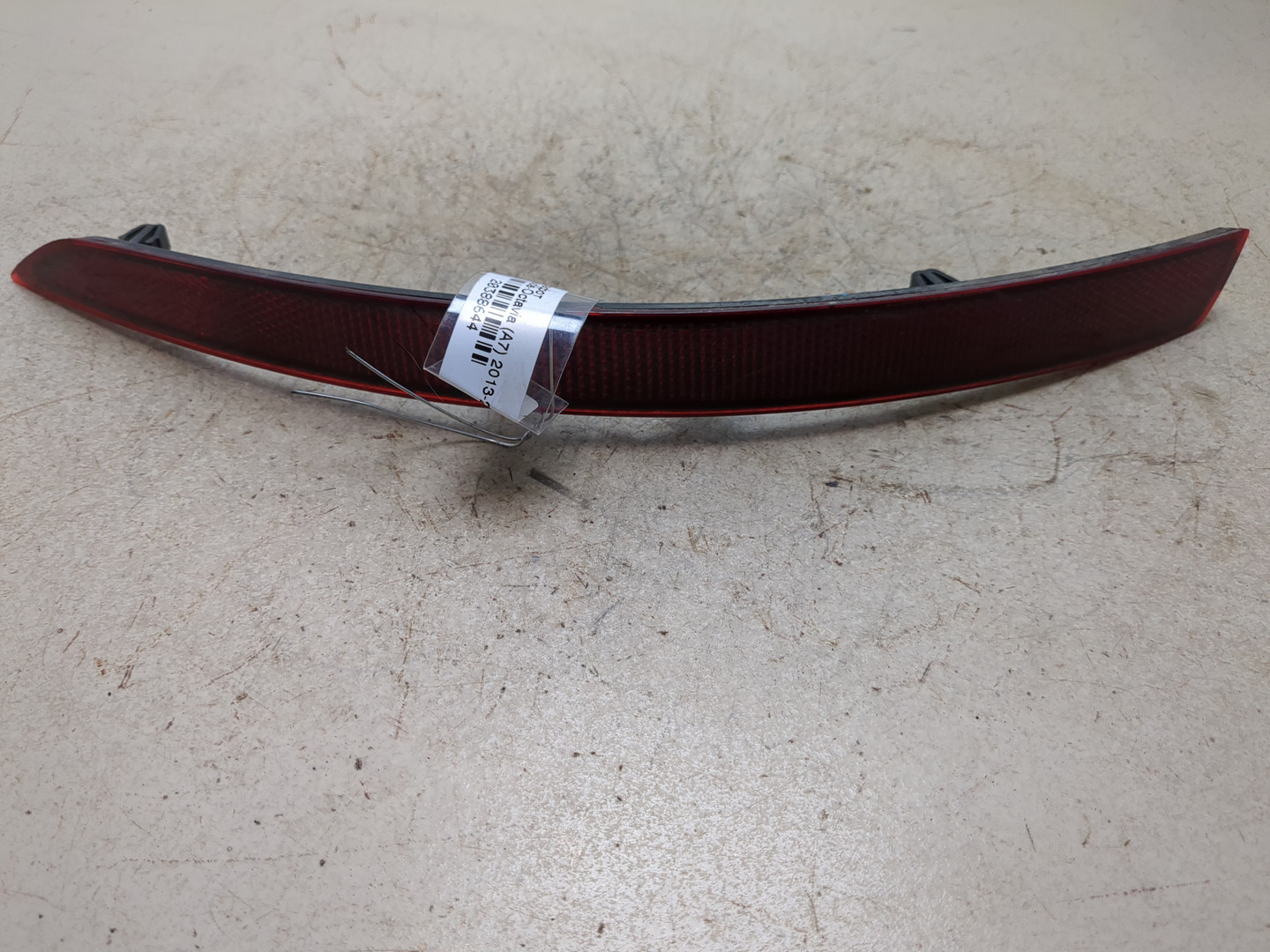 Отражатель в бампер задний левый