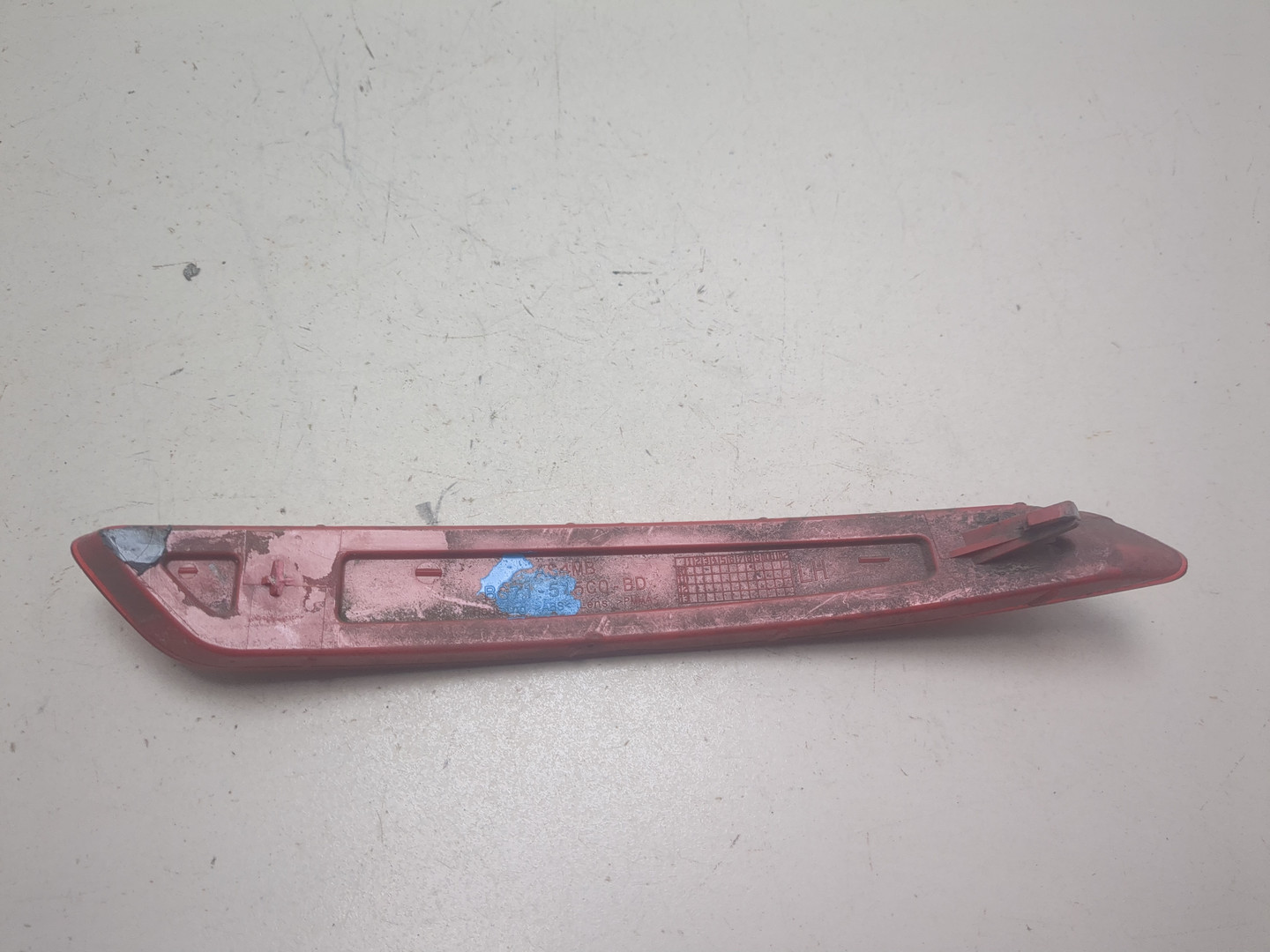 Отражатель в бампер задний левый