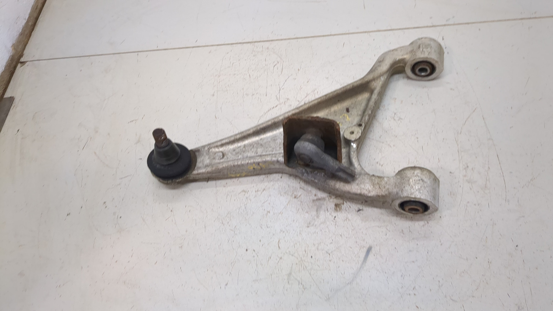 Рычаг задний левый