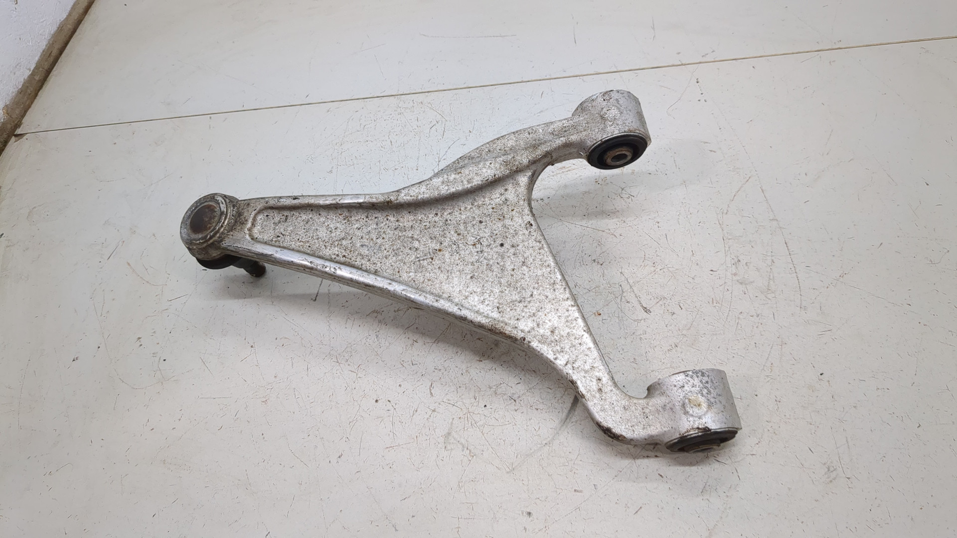 Рычаг задний левый