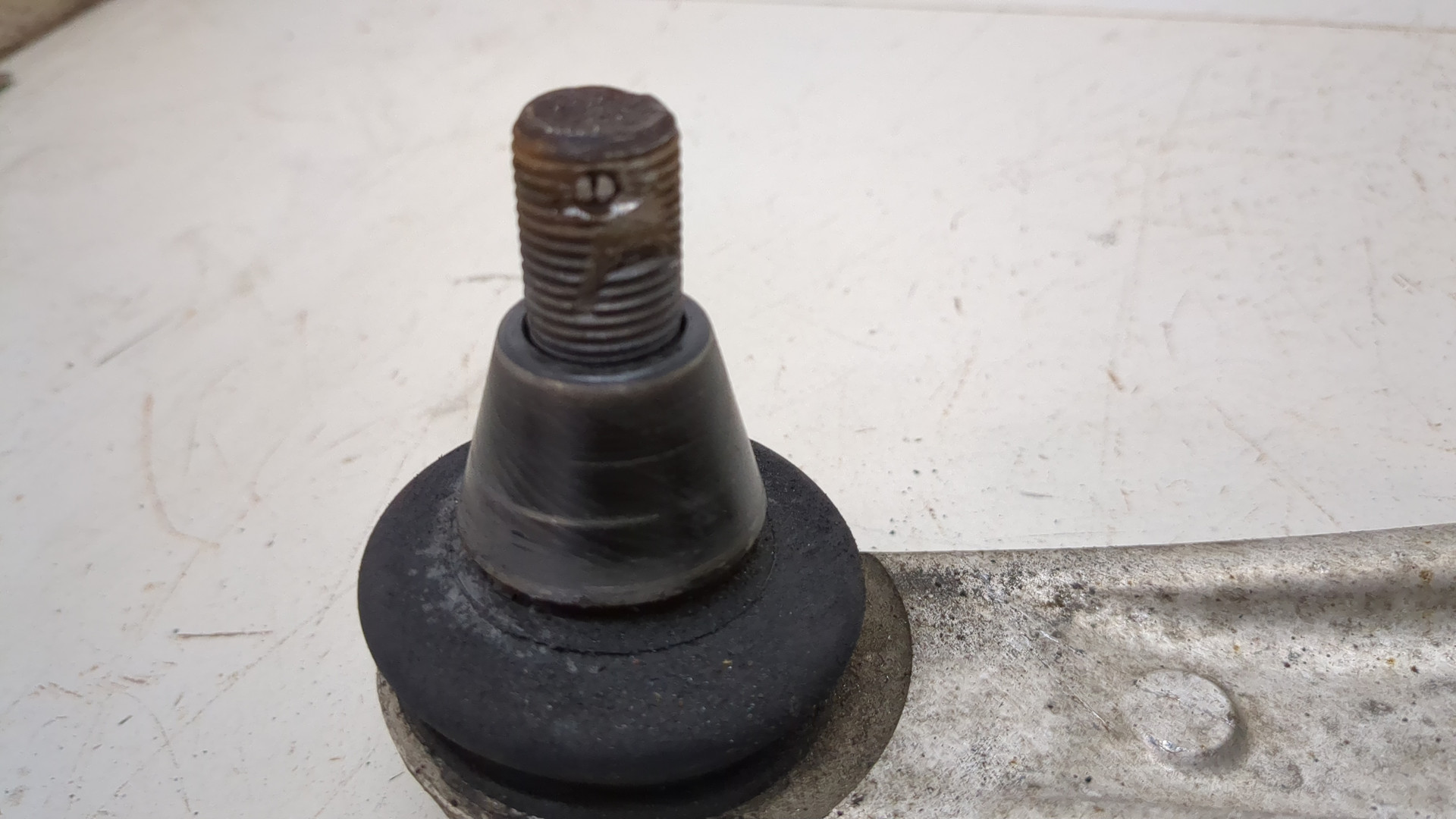 Рычаг задний левый