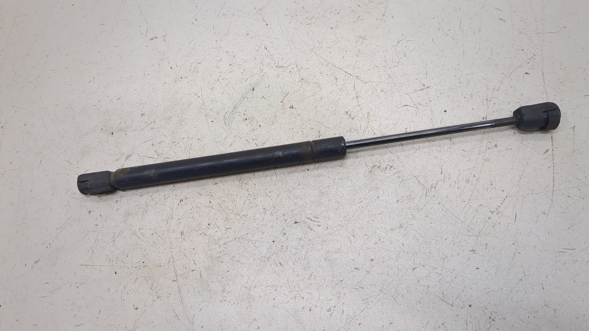 Амортизатор капота