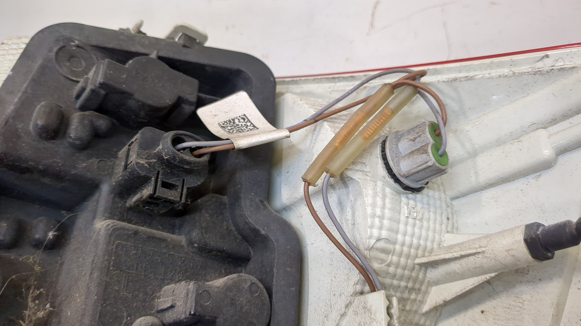 Фонарь задний левый