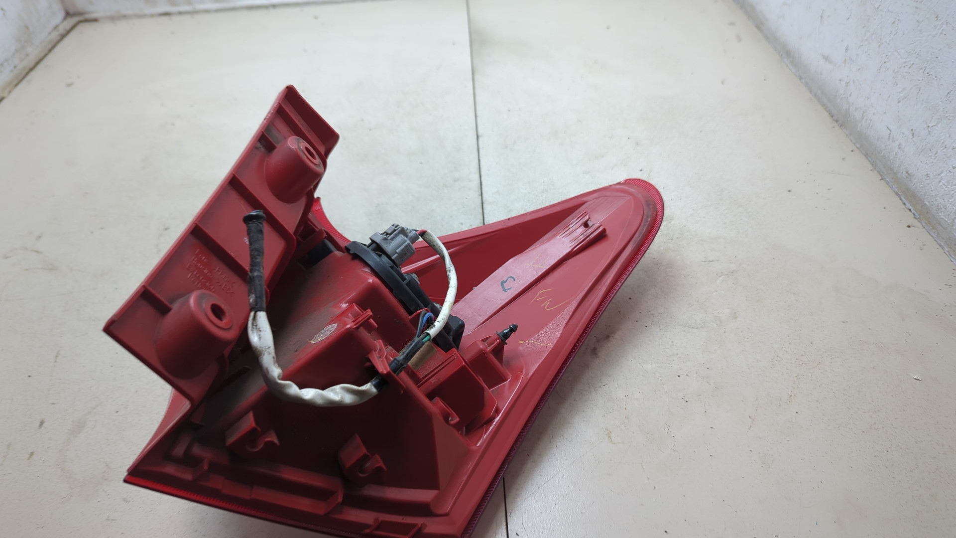 Фонарь задний левый