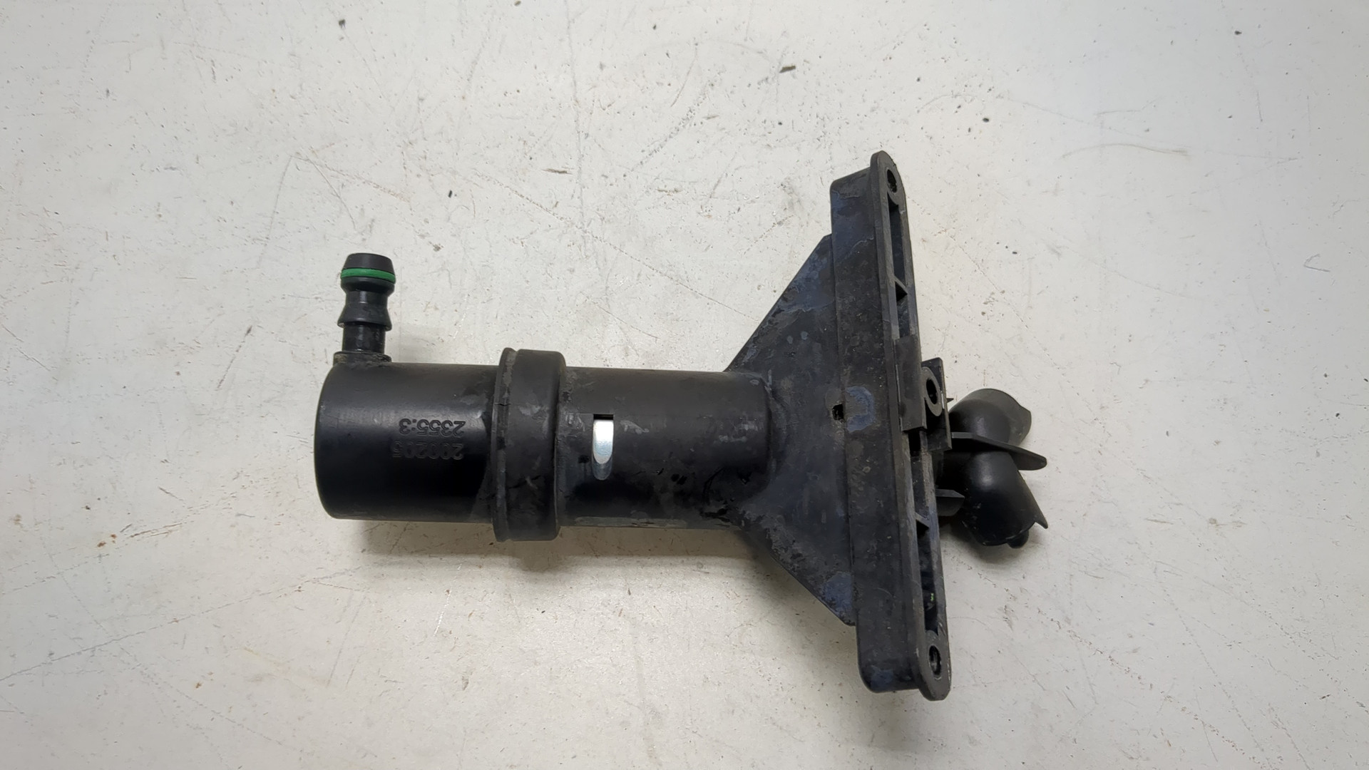 Форсунка омывателя фары