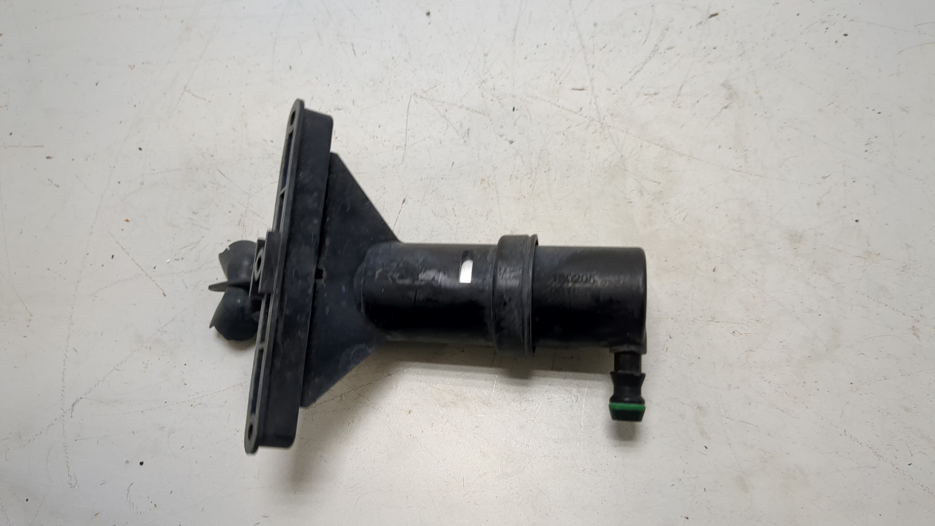 Форсунка омывателя фары