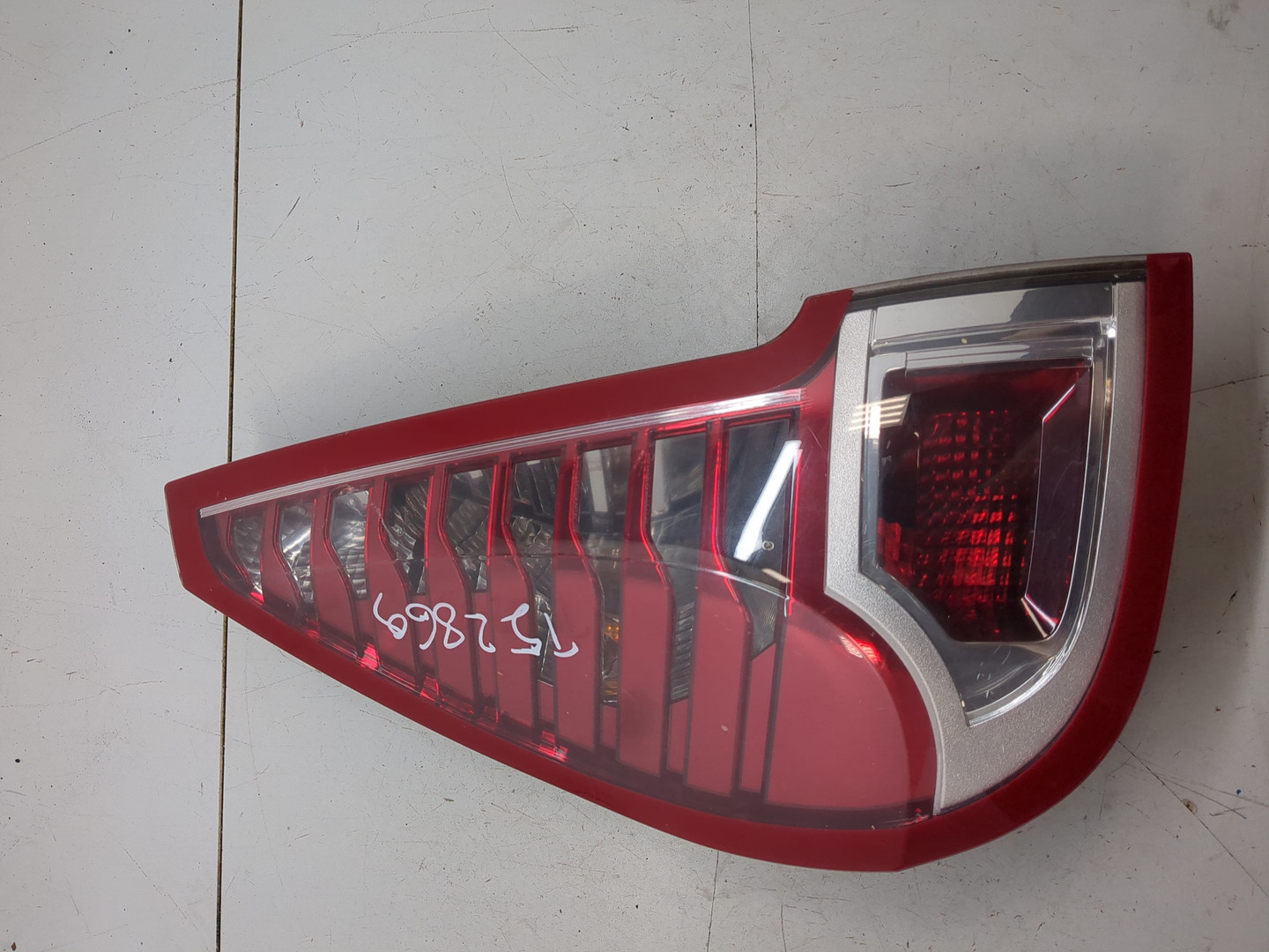 Фонарь задний левый