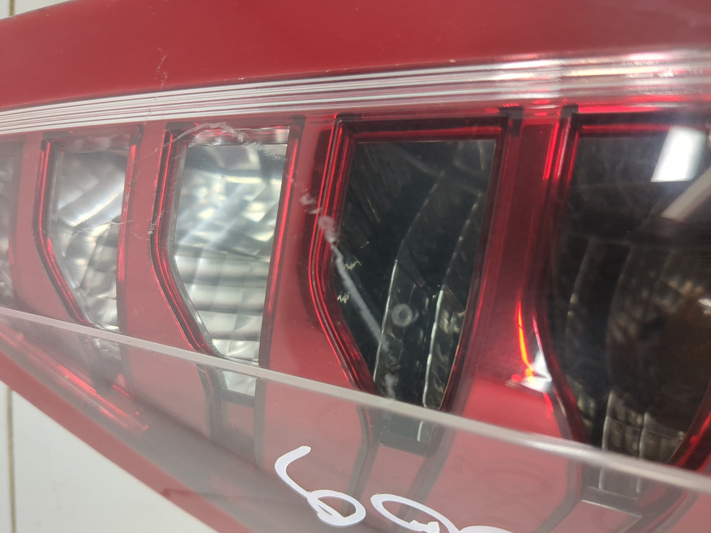 Фонарь задний левый