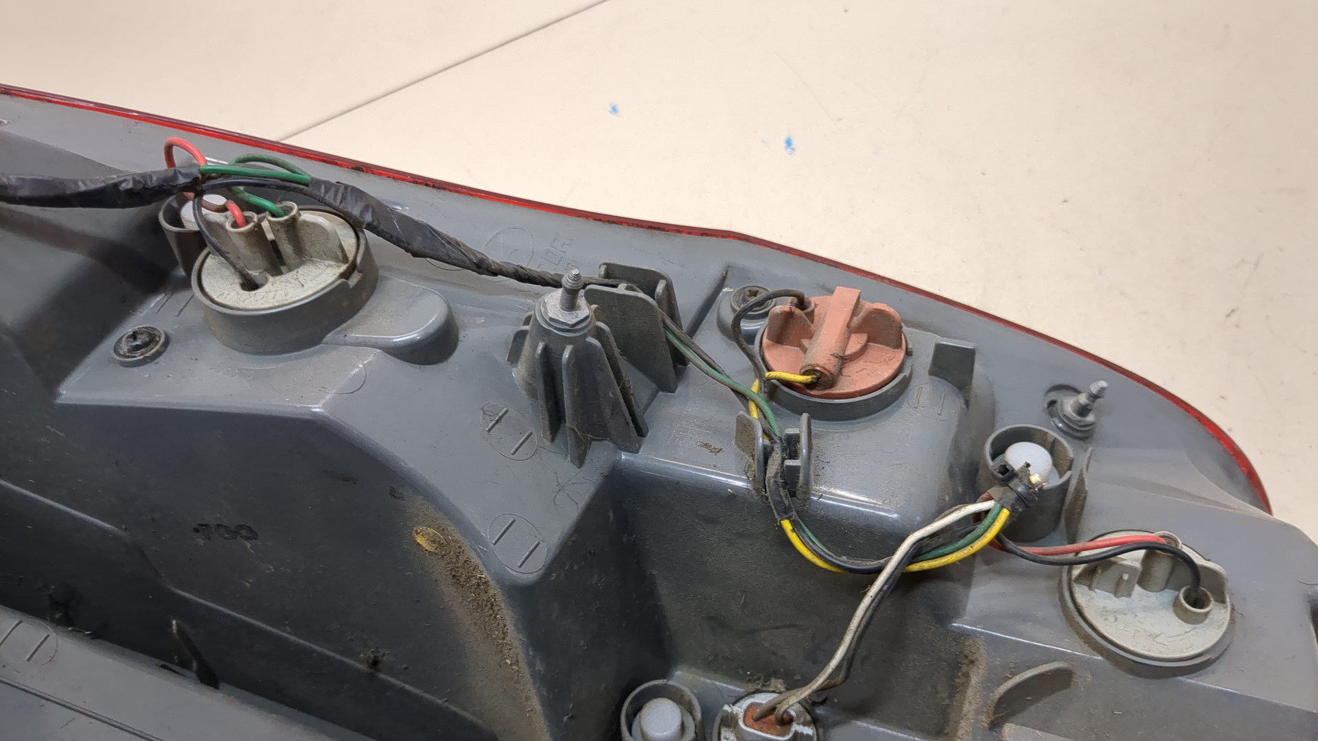 Фонарь задний левый