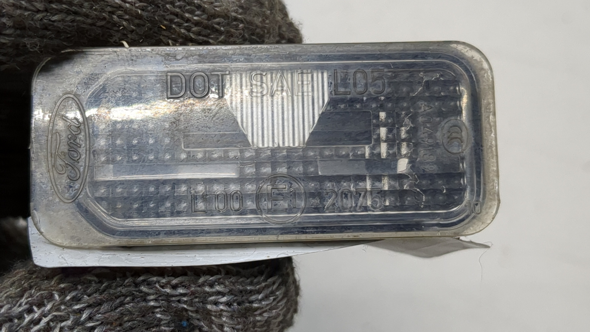 Фонарь подсветки номера