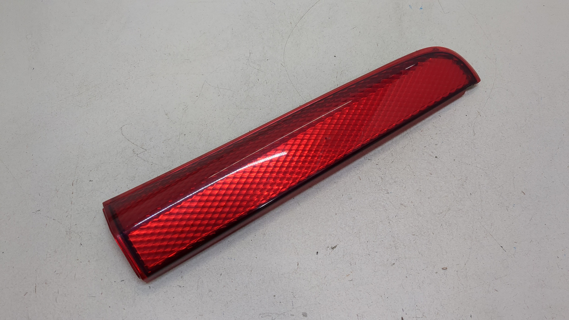 Отражатель в бампер задний левый