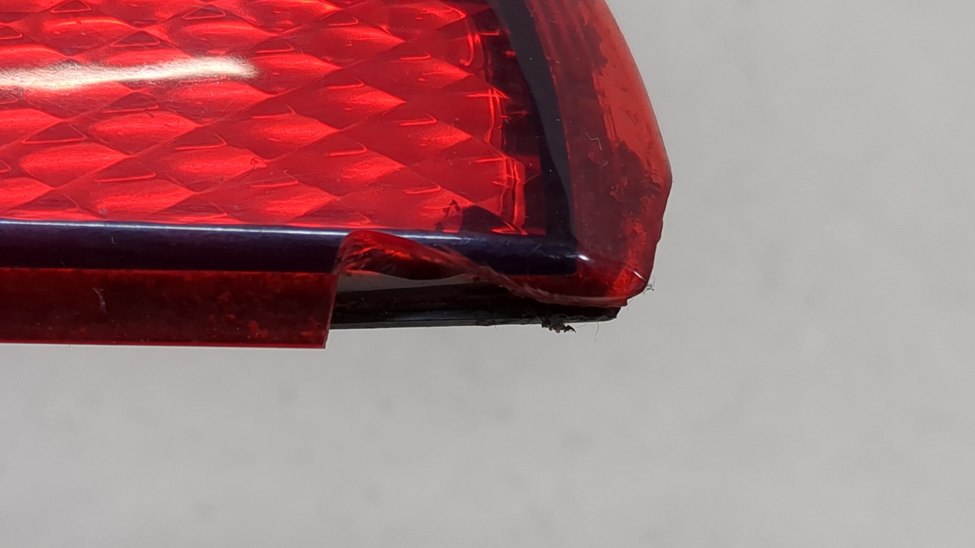 Отражатель в бампер задний левый