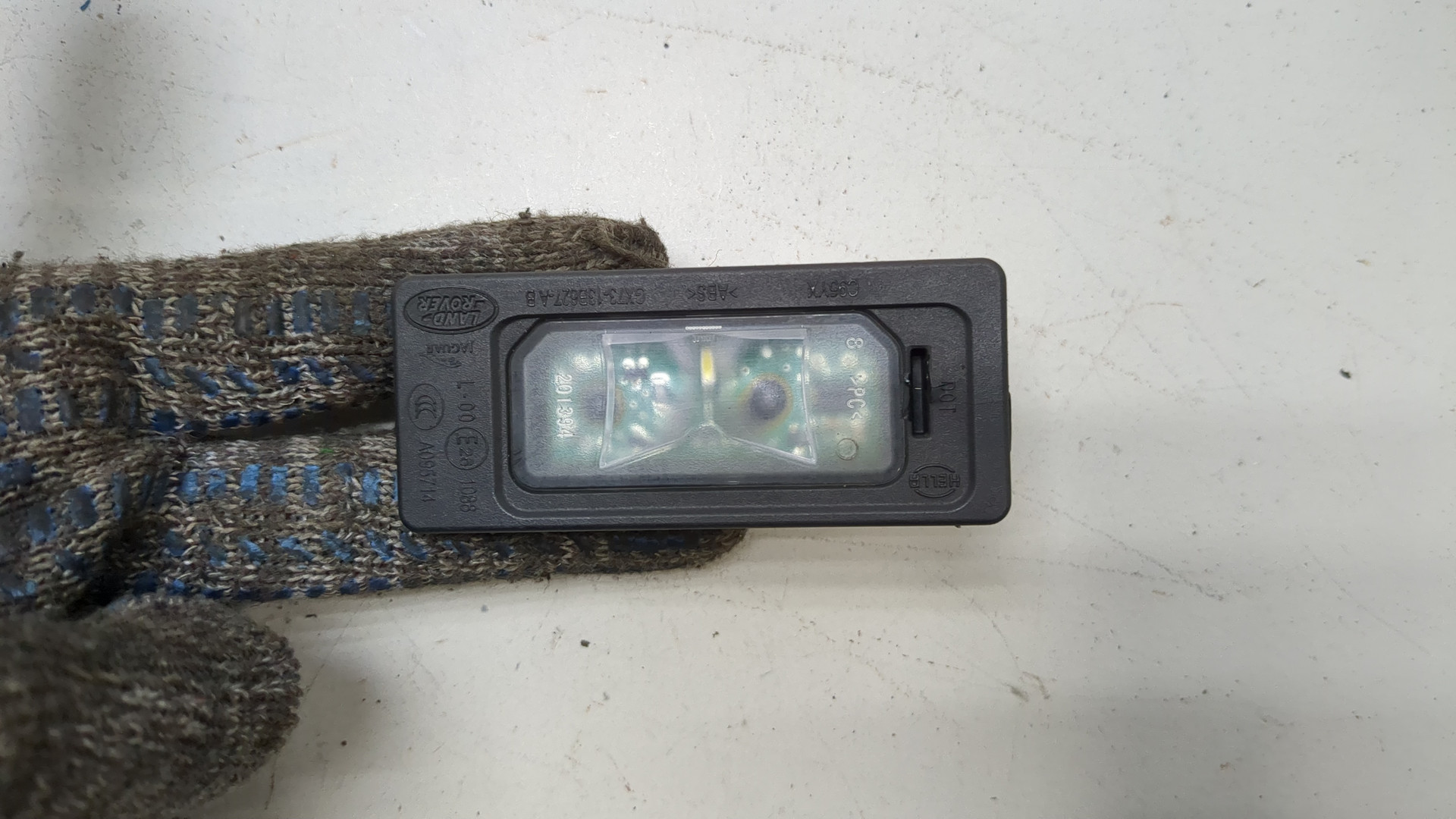 Фонарь подсветки номера