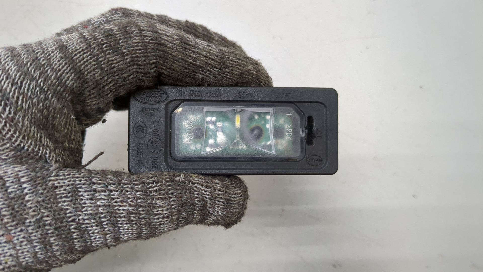 Фонарь подсветки номера