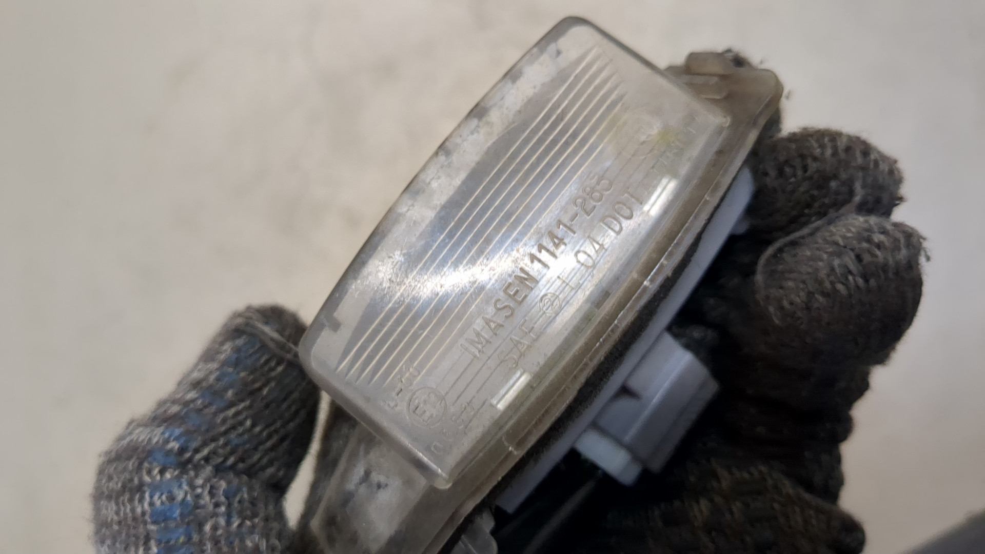 Фонарь подсветки номера