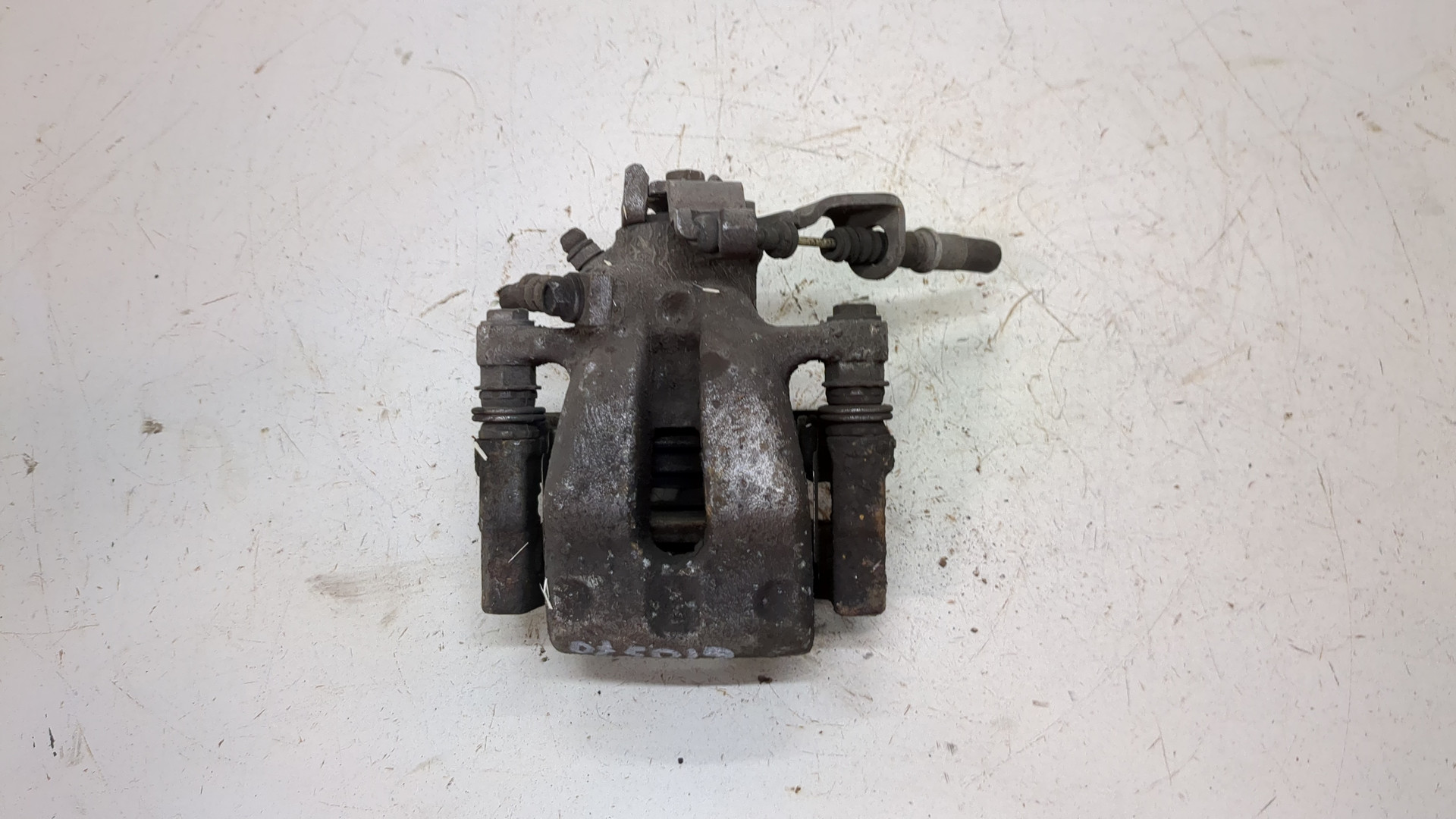 Суппорт задний левый