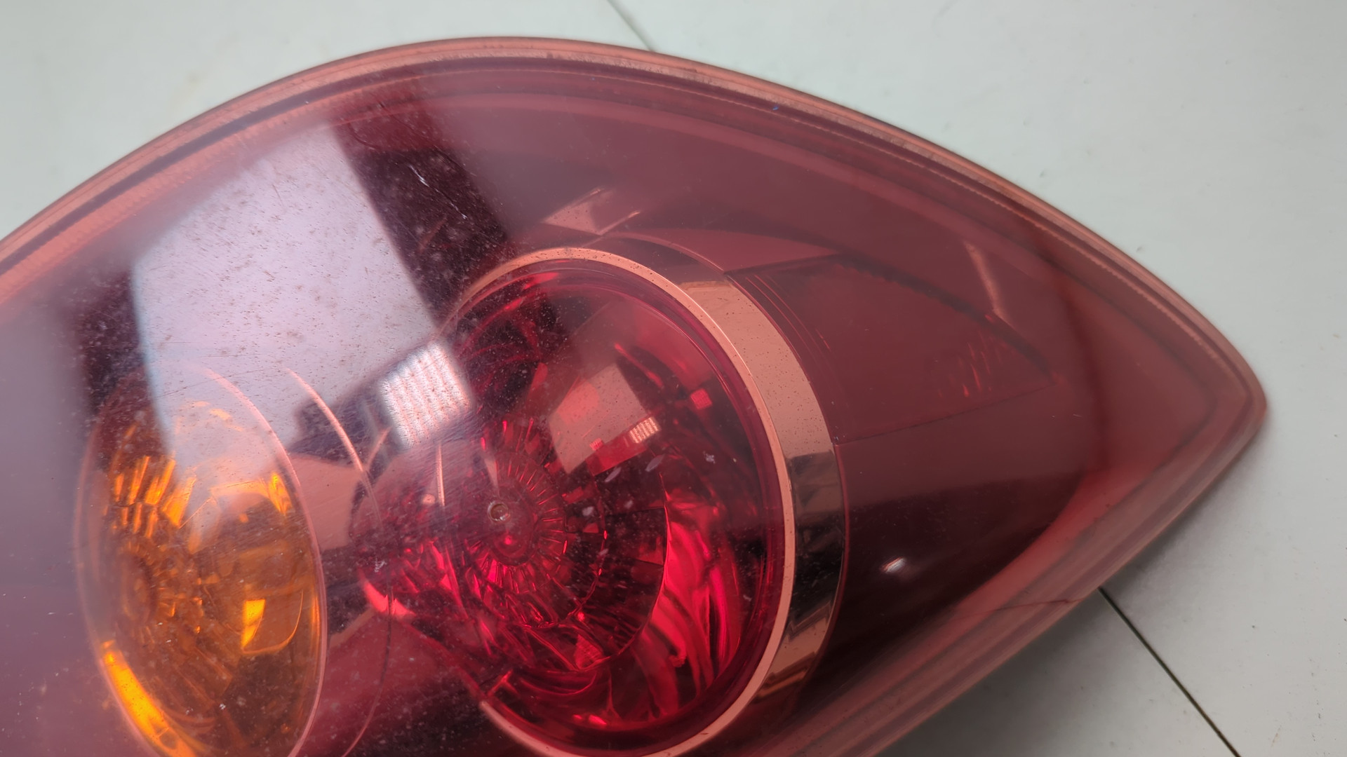 Фонарь задний левый