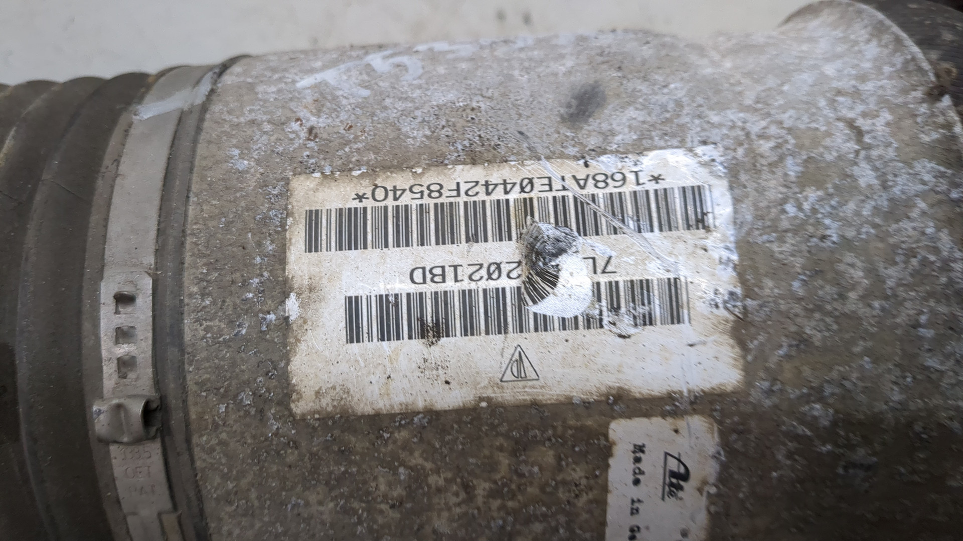 Амортизатор задний левый