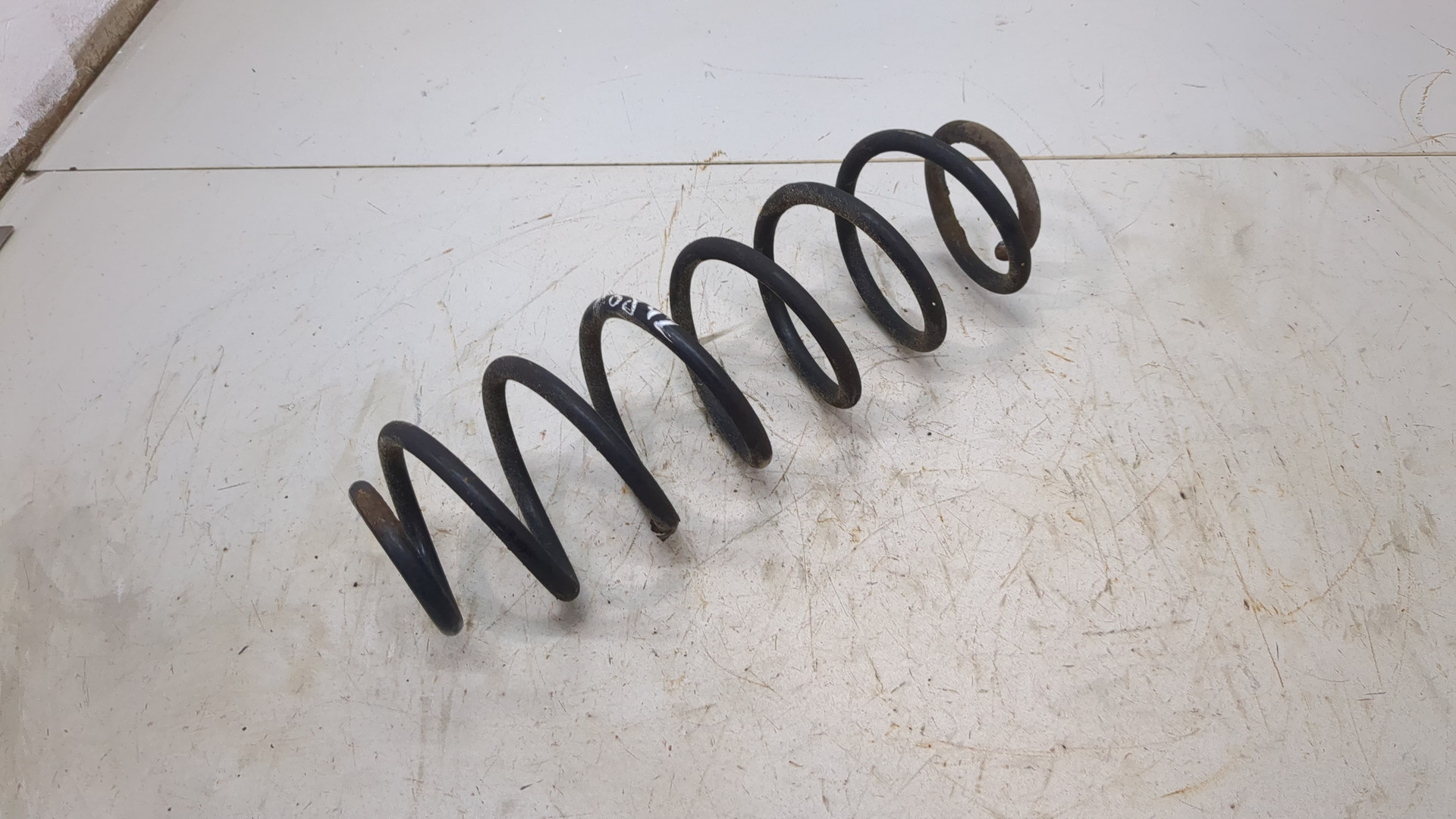 Пружина задняя