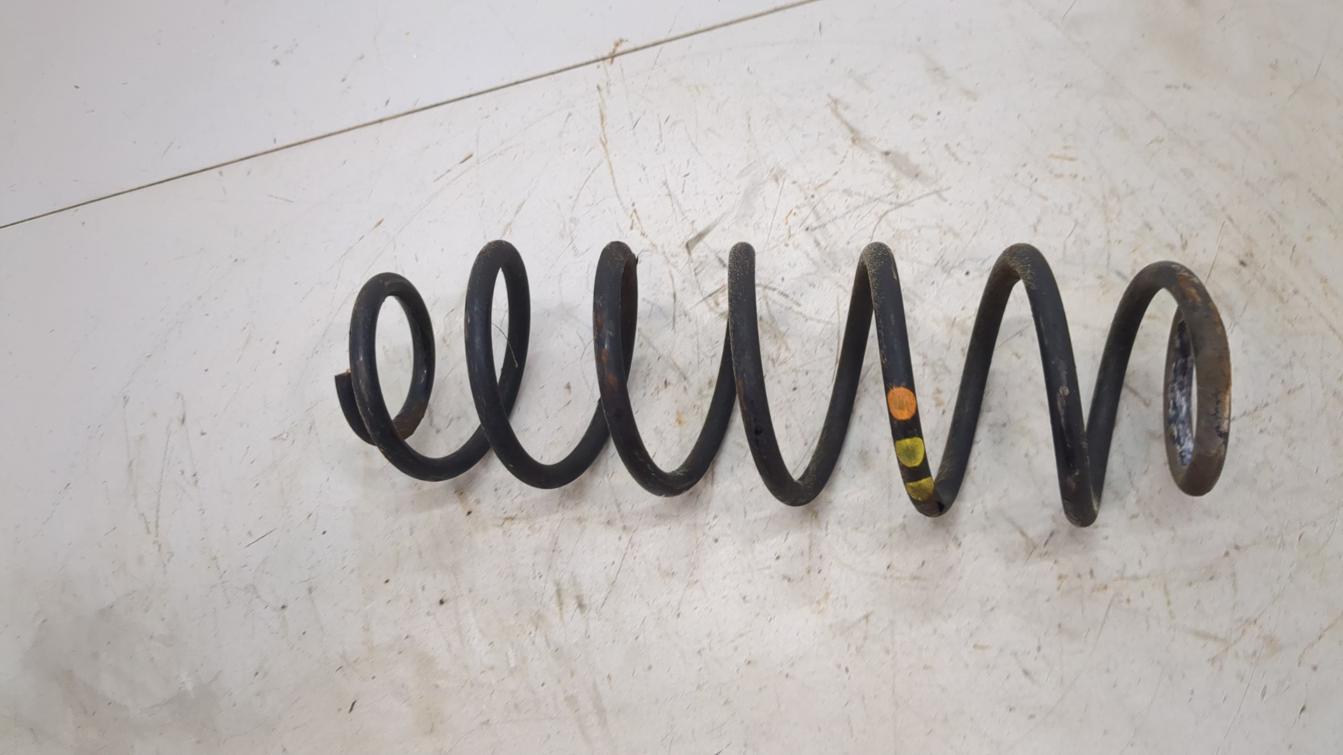 Пружина задняя