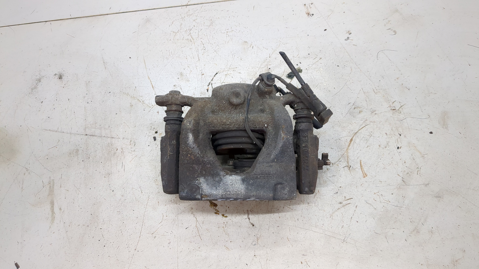 Суппорт передний левый