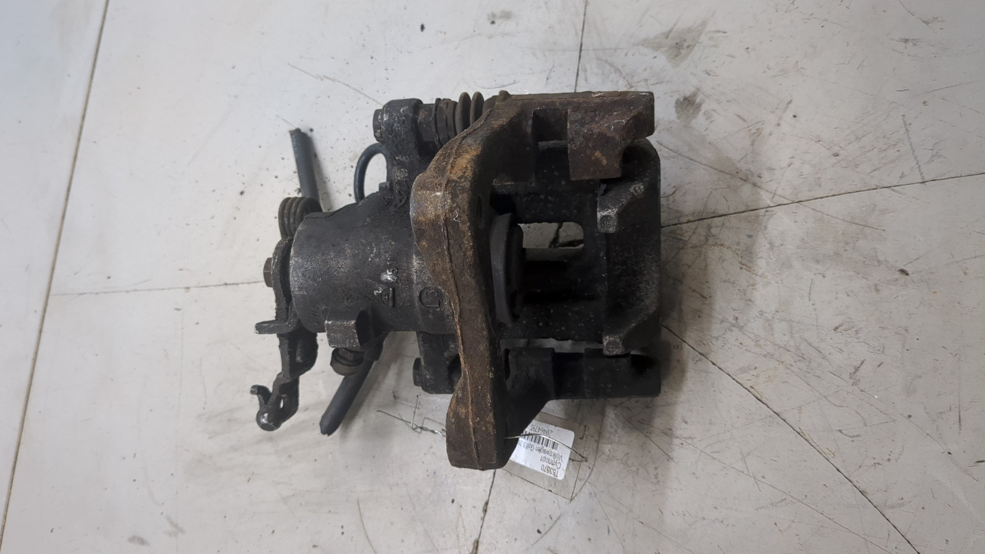 Суппорт задний левый