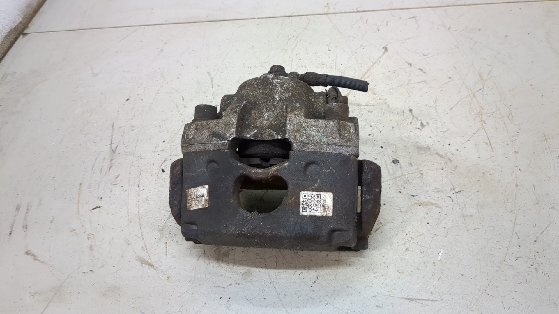 Суппорт передний левый