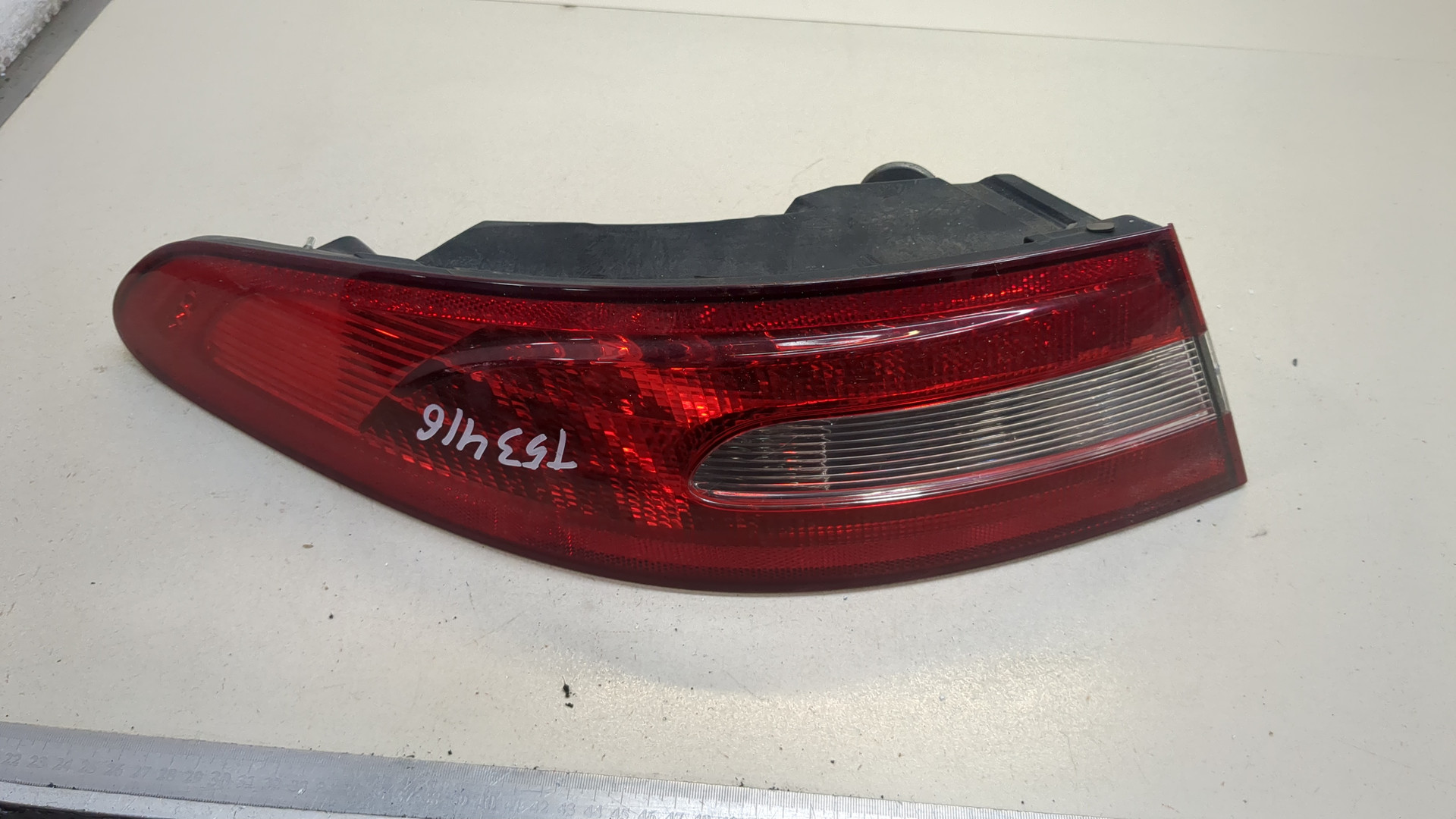 Фонарь задний левый