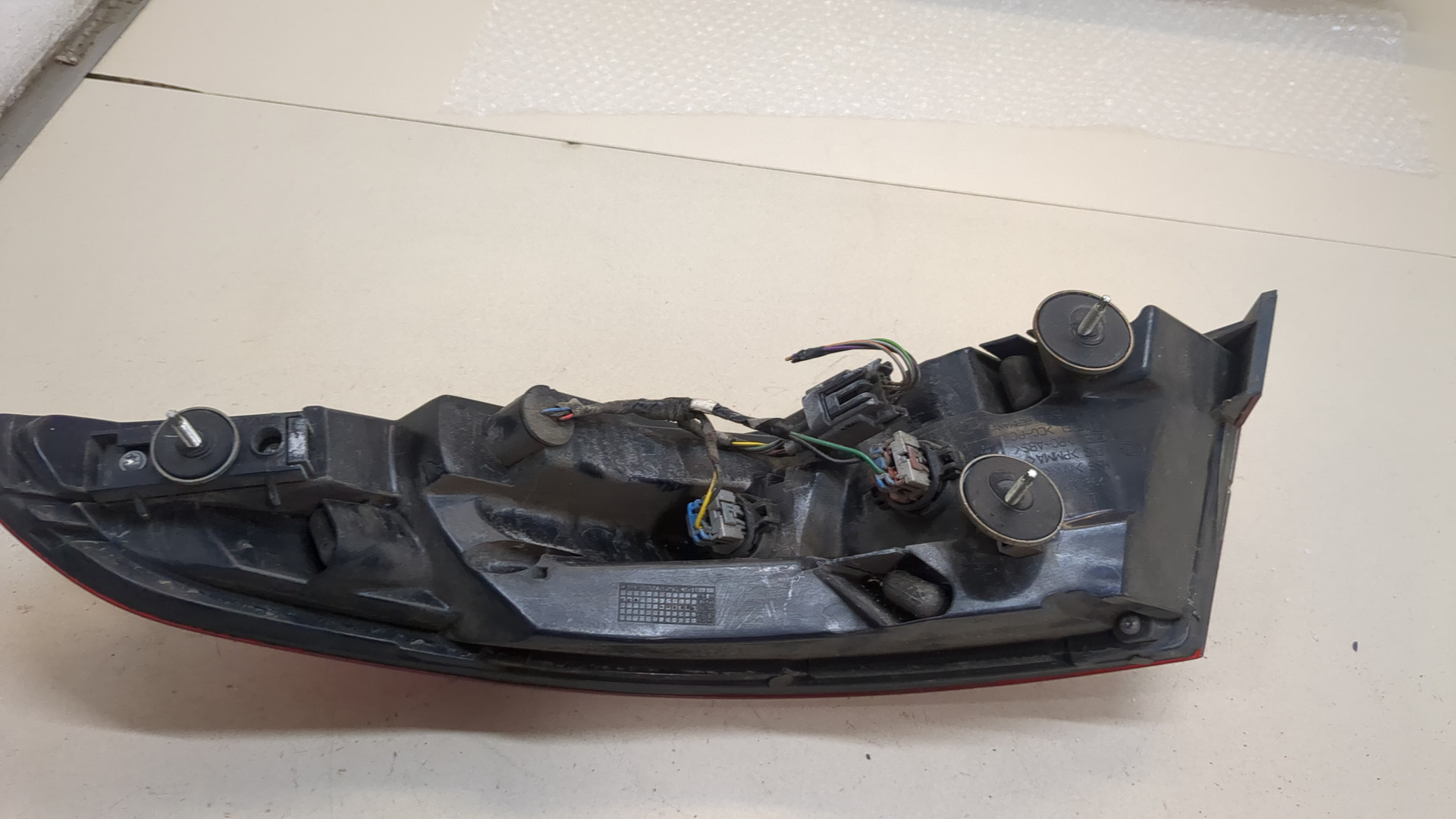 Фонарь задний левый