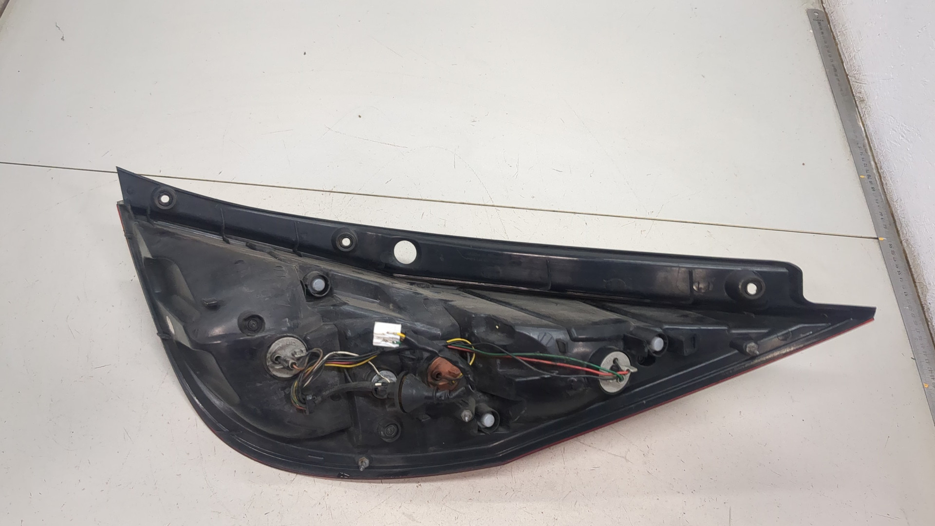 Фонарь задний левый